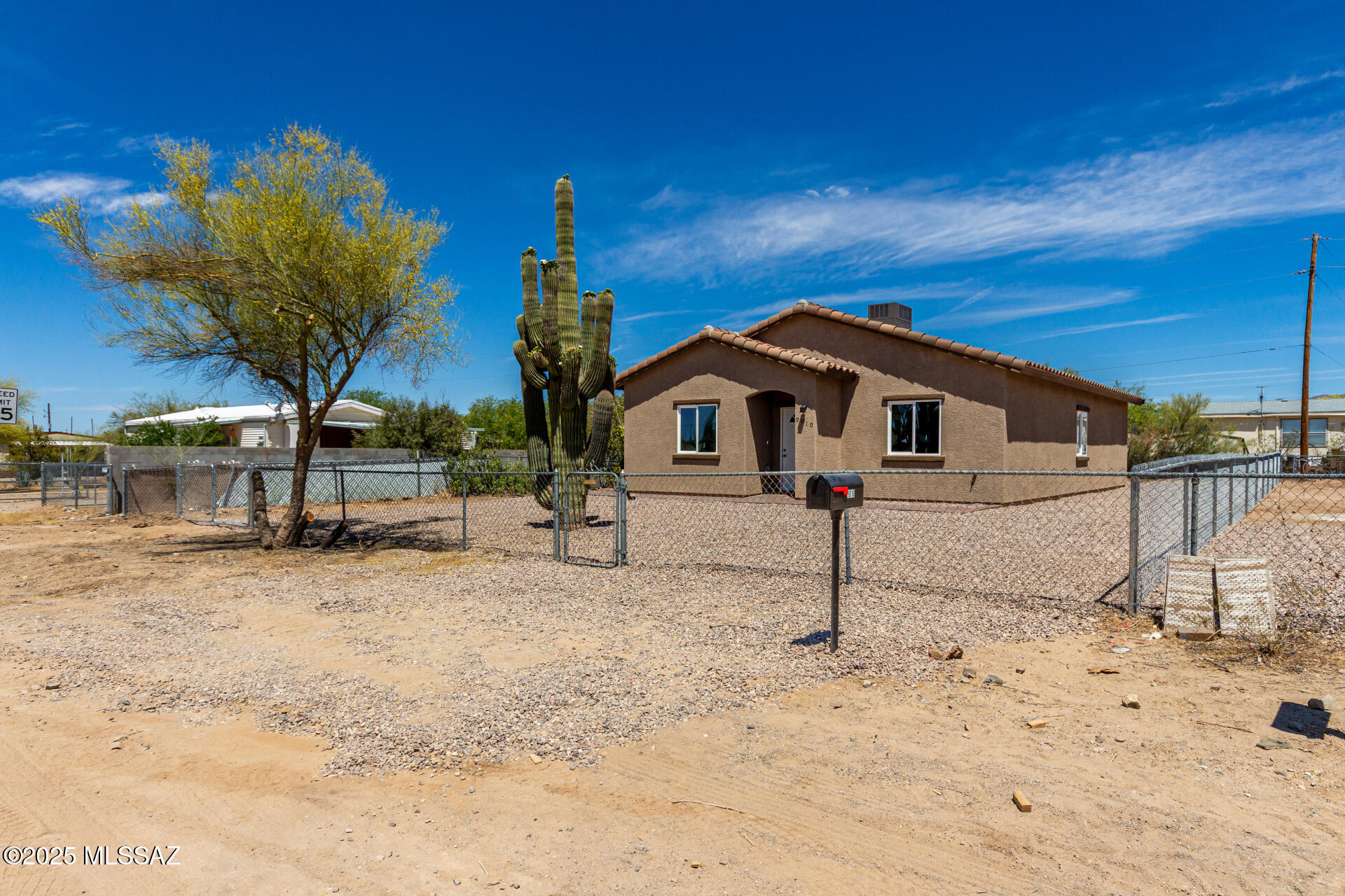 This spacious new construction home boasts 3 bedrooms, 2 bathrooms, and 1368 square feet of living space. The open design floor plan makes for a comfortable living environment, while the can lights and tile flooring add a touch of elegance. The kitchen features alder wood cabinets, granite counters, and plenty of storage space. In the bathrooms, you'll find floating cabinets, decorative pebble tile showers, and upgraded fixtures. Each room is equipped with ceiling fans, nice size closets, and high ceilings for added comfort. Outside, the property offers pavers, mature trees, decorative gravel plus is completely fenced.