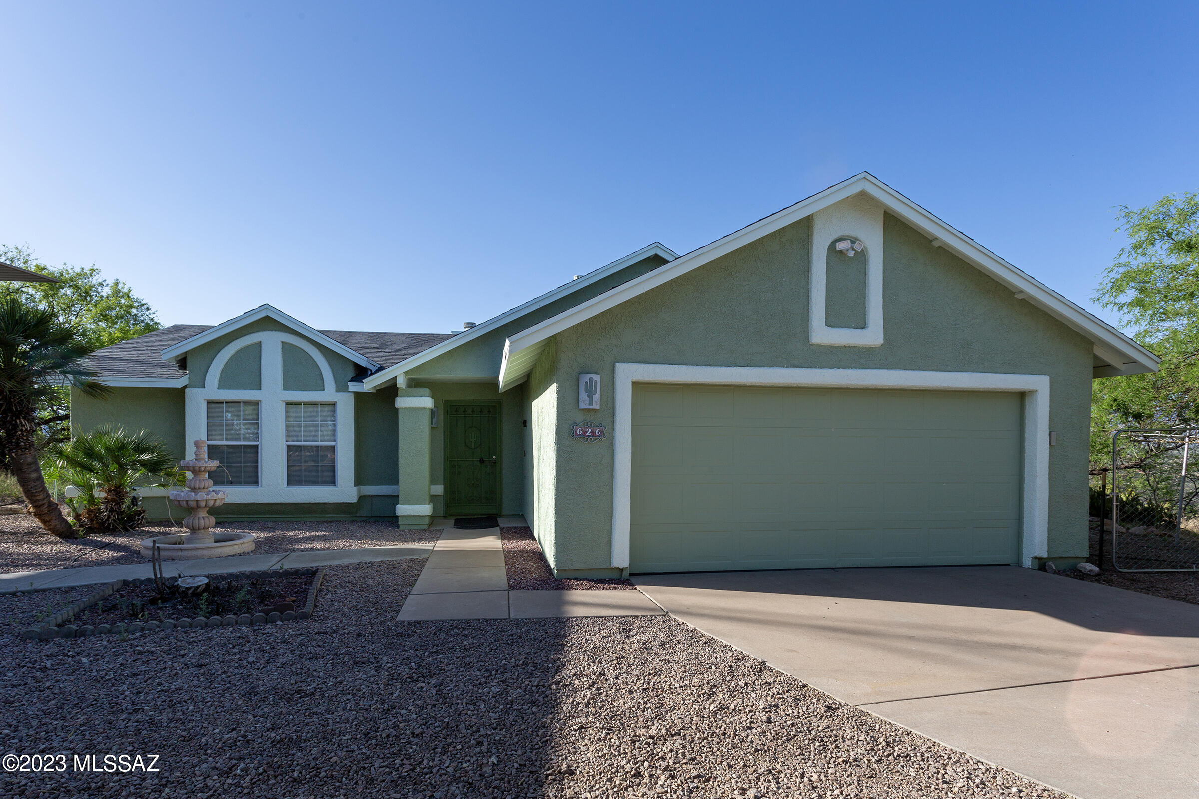 You will definitely appreciate this homes privacy and beauty with open areas of the living room & sunken area conversation room. The kitchen features include tile counter tops, refrigerator, SS appliances, vaulted ceilings and tile floors through out. Other features, Covered RV carport, a separate shed for more storage. Enjoy the covered back patio looking out on 1.85 acres with a spectacular serene setting overlooking the panoramic views of the San Cayetano Mountains.