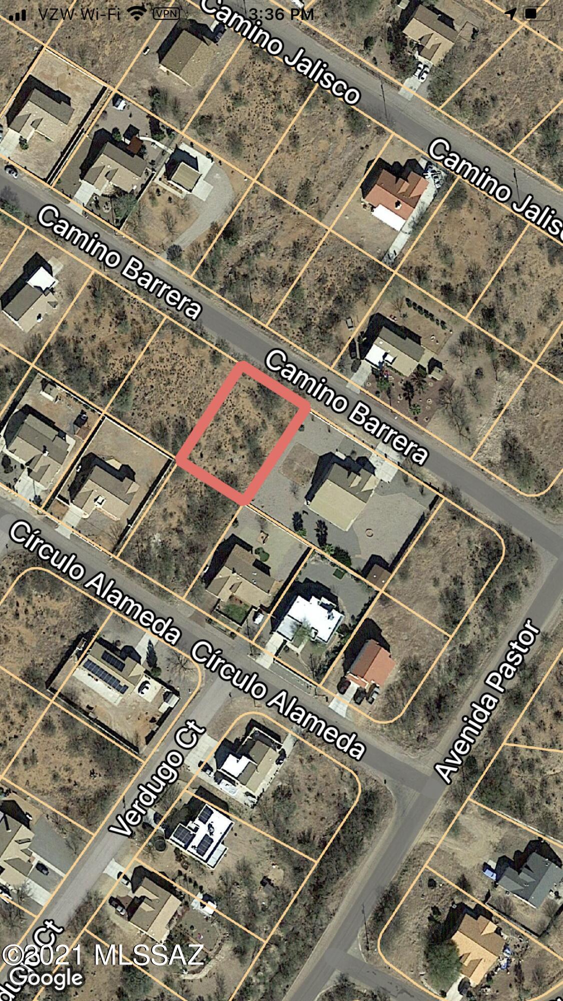 Flat easy to build on lot with all paved road access.