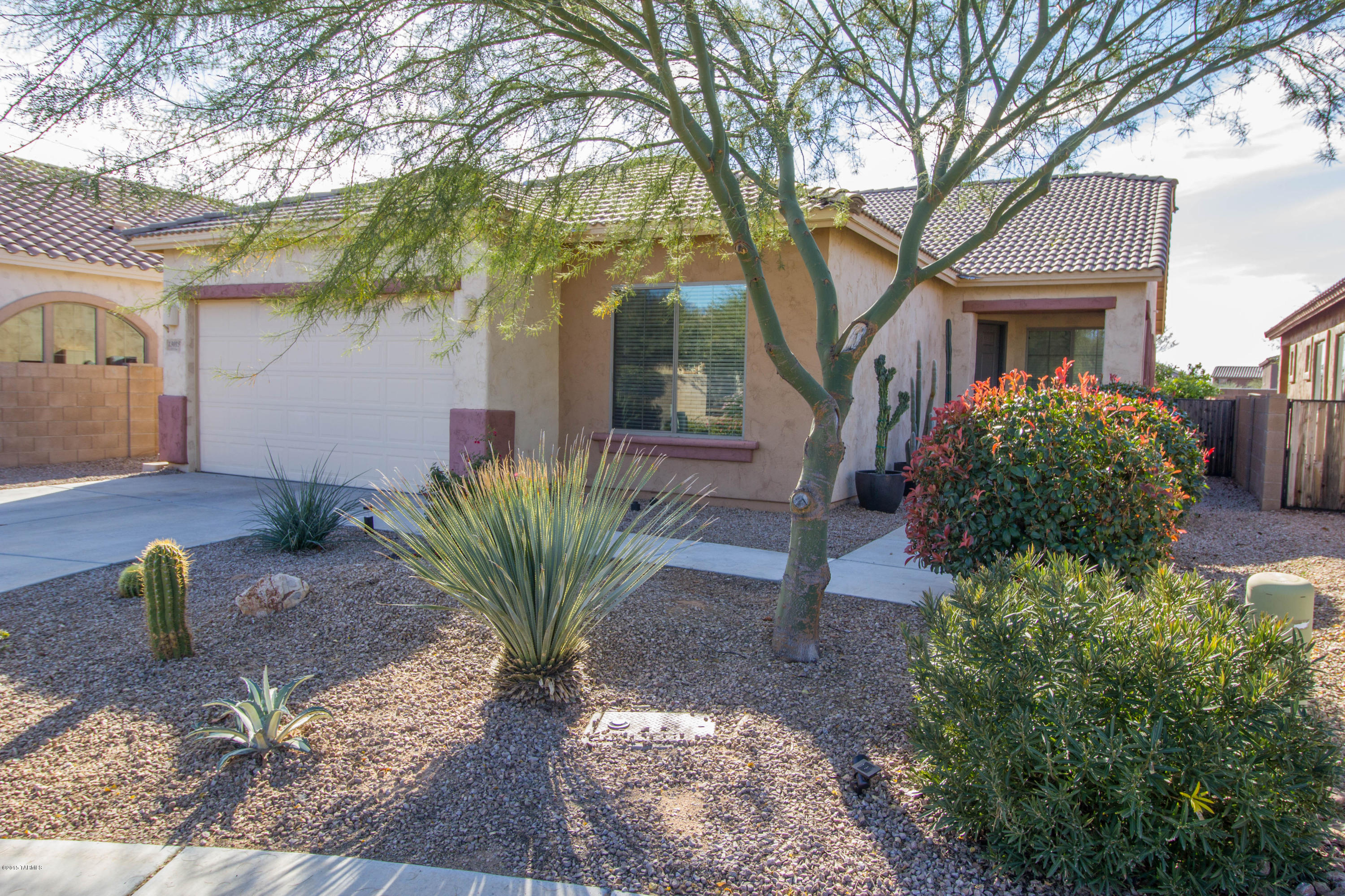 Come visit this upgraded single level home in Rancho Vistoso.  1st and only Owner has taken immaculate care of this home!  Open floor plan with 10' ceilings and stainless steel appliances in the kitchen.  Huge master retreat with large walk in closet.  4th Bedroom has beautiful dark wood floors and could be used as an office.  Landscaped Backyard BBQ with built in Fire Table, Turf Grass and putting green.  Laundry Room with Utility Sink. Go green with this SOLAR POWERED HOME!  Workbench in roomy garage.  Enjoy the Vistoso lifestyle - Hiking/Biking trails, Parks, Volleyball, Baseball/Softball, Basketball Court, Shopping, Golf, Medical.  Go to ranchovistosohoa.com/community-amenities for a complete list of amenities!