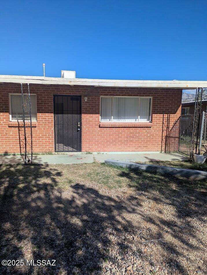 Charming 2 bedrooms, 1 bath, home in central part of town . Includes fridge and full-sized gas stove/oven. Tile throughout.  Window/wall AC's & Ceiling fan cooling. Private patio with nice sized fenced back yard. Washer included, Dryer hookups on covered patio off Bedroom 1.  Huge kitchen with pantry.  Water/sewer/trash are included in rent. Pets are on approval with additional pet fee.