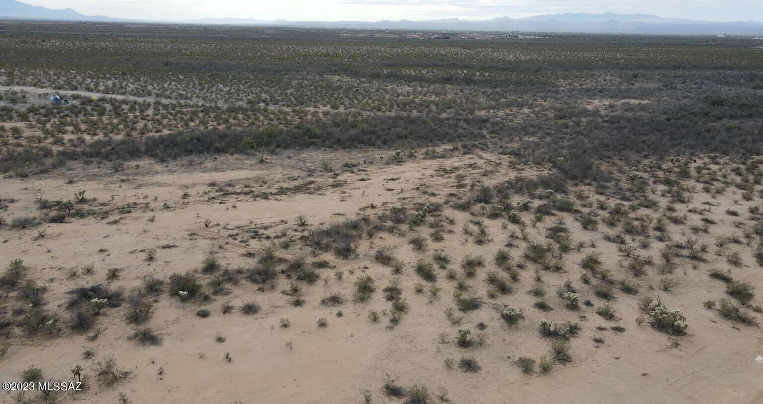 12.694 acres, Lot is zoned CI-2 commercial industrial. The property is in the riparian flood zone area and zoned as open space. Seller does not guarantee use ability of the parcel.
