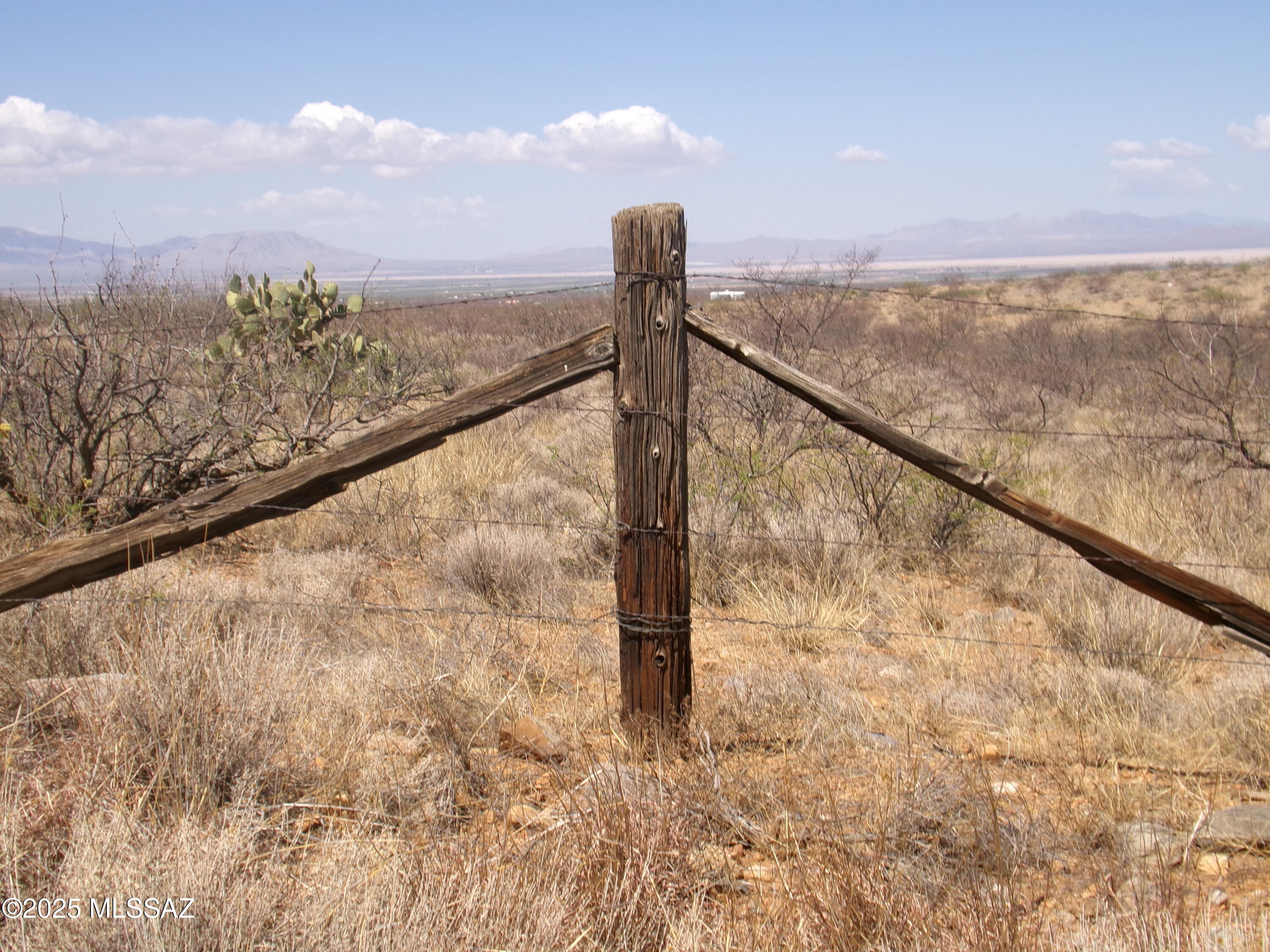 Fenced 38.87 acres off Jeffords Trail about 3.5 miles from State Highway 186. Mostly flat land and some rolling hills.  Electric pole is right across the road.  Small sq. footage of the corner is in a flood zone. Great view of the valley below and mountain views. Horses are allowed.