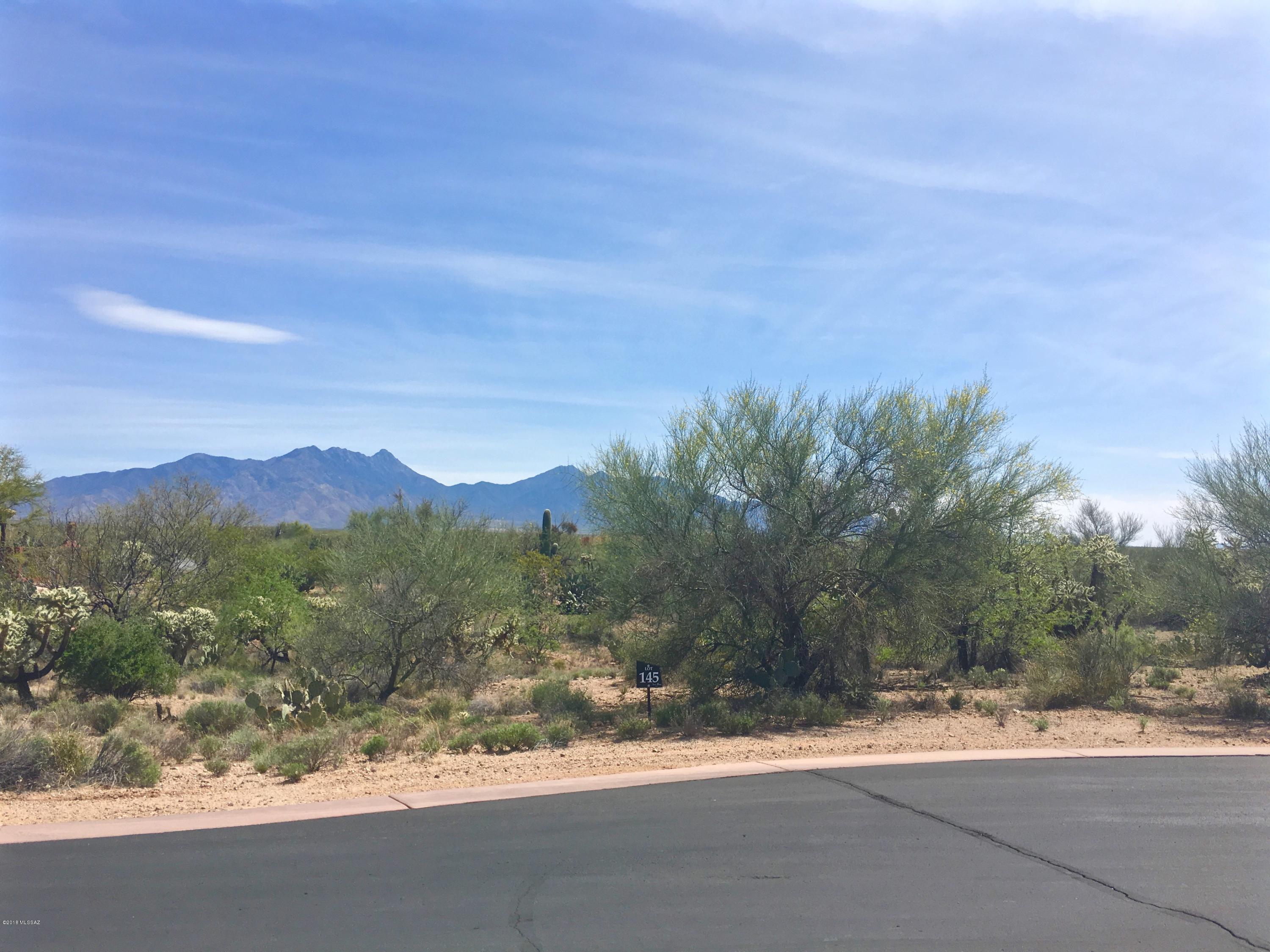.7 acres with great orientation for back yard views of the Santa Rita Mtns. Stone House is a gated, custom-home community. Enjoy the natural Sonoran Desert with trails and washes throughout the community. The neighborhood was designed to preserve natural wildlife corridors. Use your own architect, or have your custom home built by Terracotta Builders, Morgan Bros., AF Sterling Custom, or AB Le Cocq. Call about rolling land and construction loan into one.