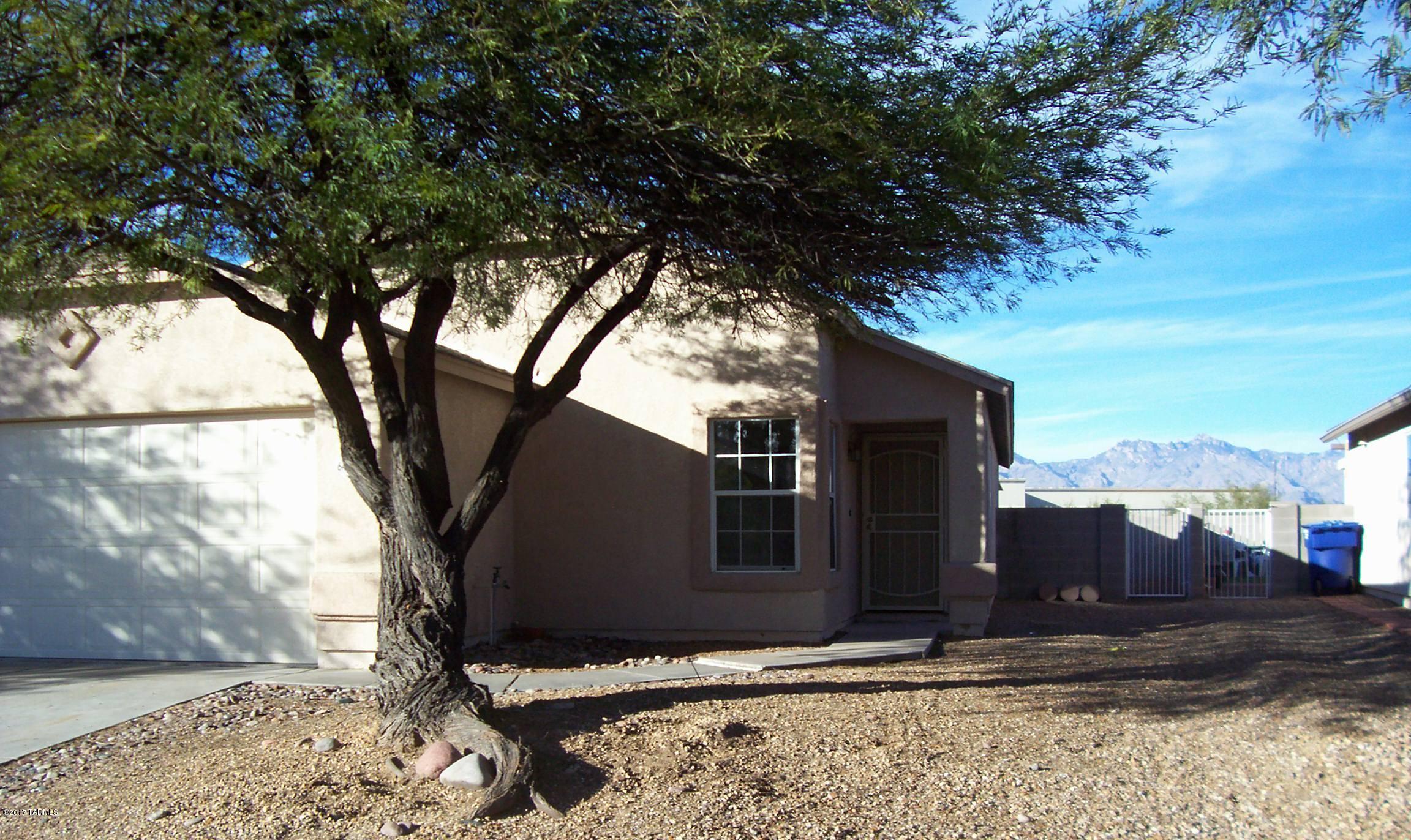 Estate Sale. 4 bedrooms, 2 bath home in Wilmot Vista. 1567 sq ft features a great room, split bedroom plan, large lot with mountain views, low care backyard, 2 car garage. This home needs some TLC and is priced to sell. Home being sold ''AS IS''.