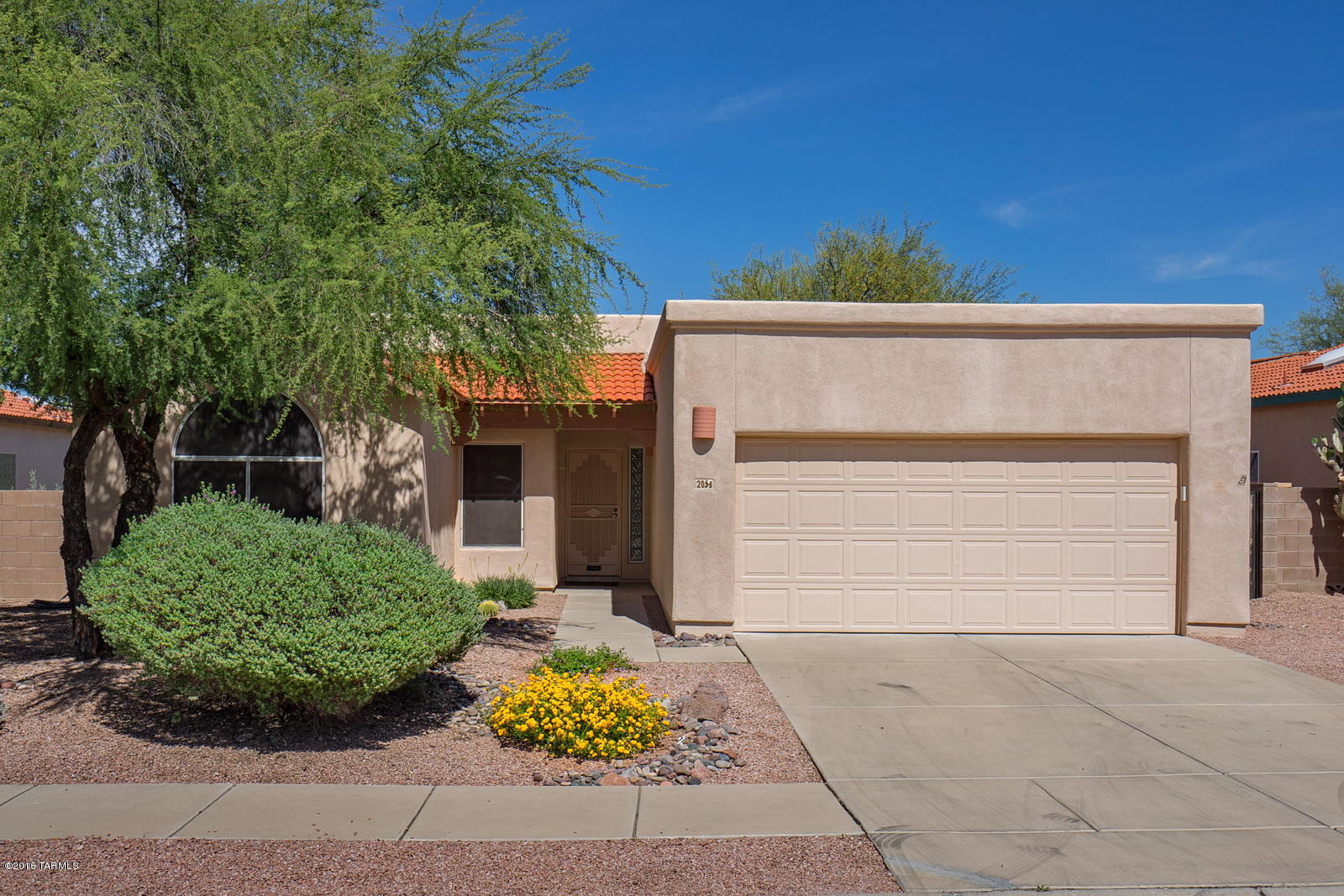 Come see this beautifully maintained 3 bedroom, 2 bathroom, 2-car garage AF Sterling home in Pantano Ranch.  The home has a desired split floor plan layout.  A huge Master bedroom suite with a walk-in closet, full bathroom and an additional closet.  Adjacent laundry room. The 2 Guest bedrooms with custom blinds share a second full bathroom.  You will find a ceiling fan in every room.  Newer neutral colored carpet in the bedrooms and living room.   Easily accessible kitchen opens to the dining area. The sliding glass door leads to a nicely east facing, covered patio.  The private custom landscaped backyard has Rincon mountain views.