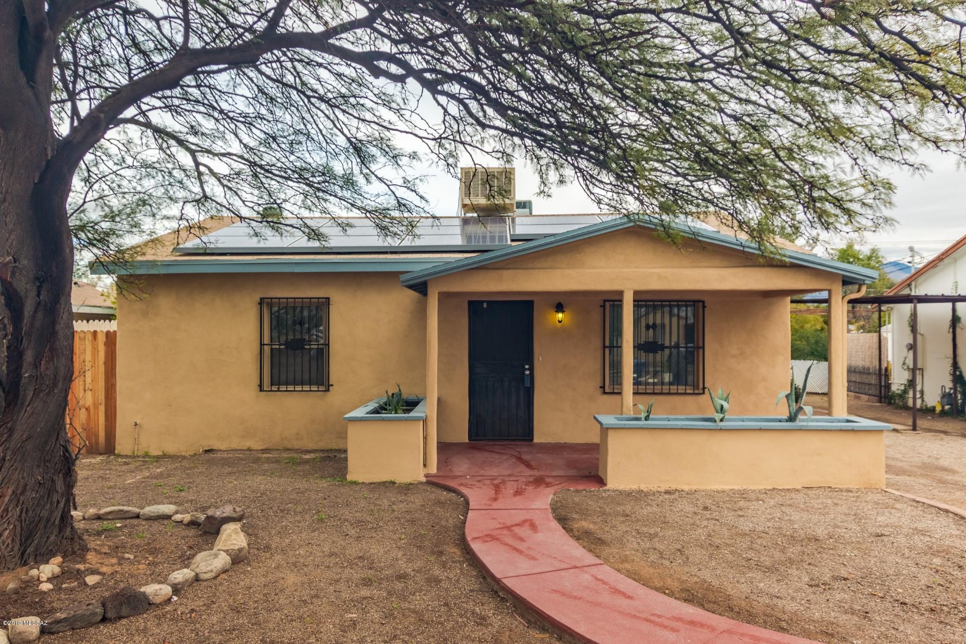 Charming 3-bedroom bungalow near UofA is completely renovated. Beautiful tile flooring t/o, ample natural lighting, neutral color scheme, rich white cabinetry, black pearl granite countertops, and stainless steel appliances are a few features this home offers. Spacious bedrooms with updated vanities. Your guests will enjoy privacy in their own casita complete with a kitchen. Enjoy your outdoor space taking in the beauty of mother nature. Don't miss out, schedule your showing today!