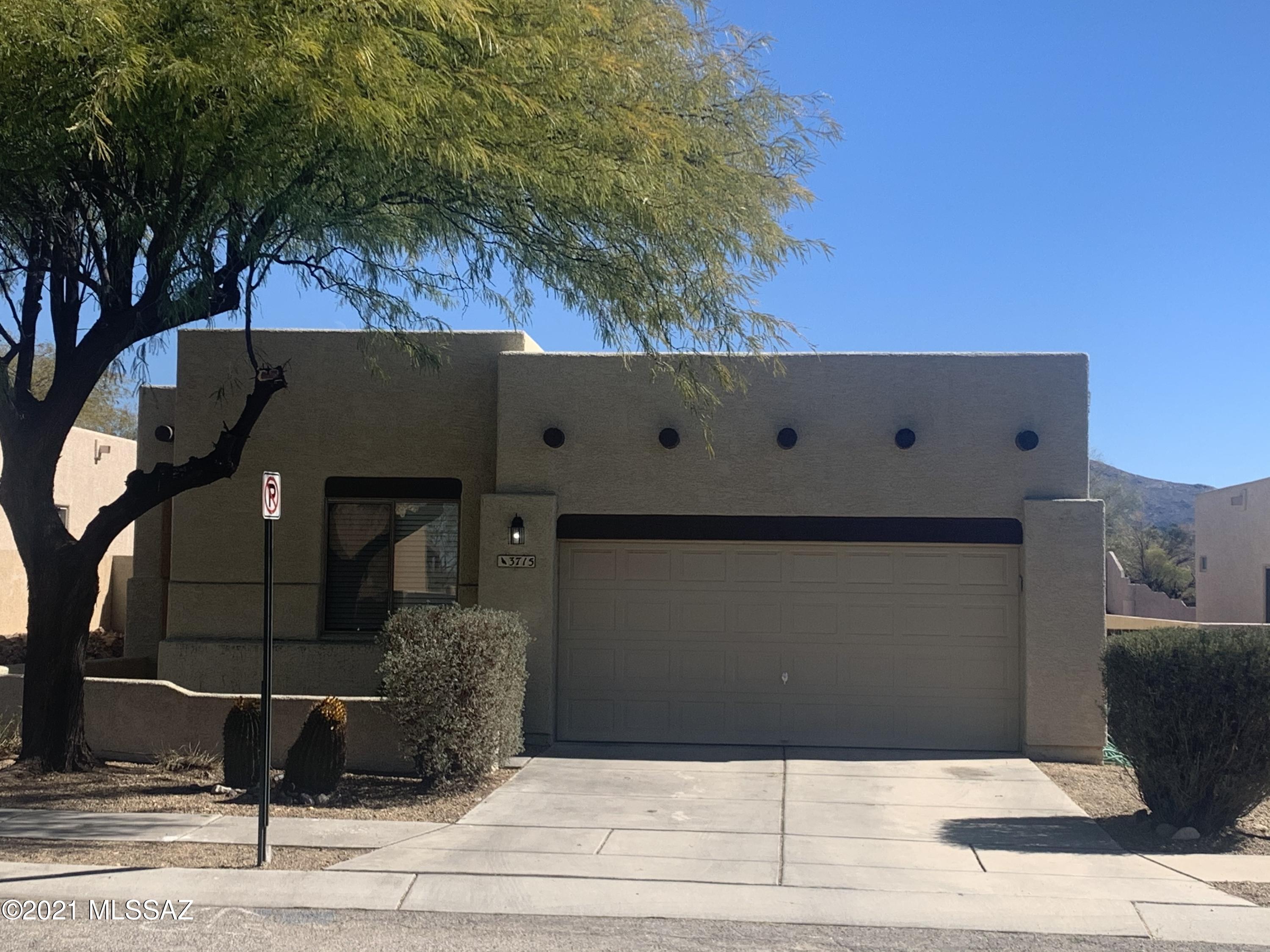 Beautifully maintained 4 bedroom Santa Fe-style home in quiet neighborhood. The whole house is clean, updated, fresh and open. Split bedroom floorplan- master suite with walk-in closet, separate toilet and shower/tub. 3 additional bedrooms for family or needed home office/school space. Many updated fixtures, including stainless appliances, dual kitchen sink, epoxy kitchen countertops and cute updated light fixtures. Lovingly cared for, the backyard has newly planted trees, new irrigation and block wall for privacy. Roof was completely replaced in 2019 and has warranty, garage door motor just replaced and upgraded, regular pest maintenance and landscaping over the years. Don't miss the rare chance to get into this peaceful neighborhood- the last house in here sold 2 years ago.