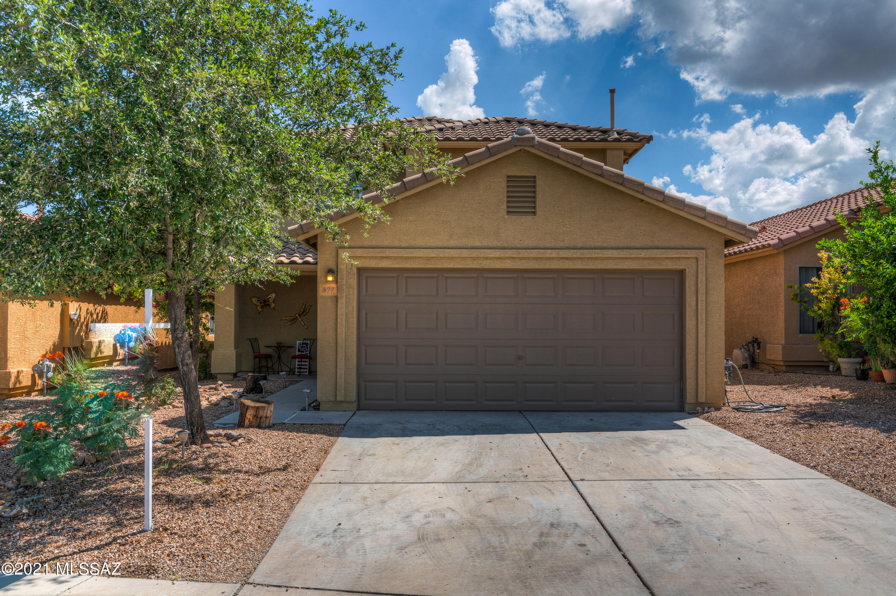 Move in ready on a premium lot! Enjoy unobstructed views from the covered rear patio. Gorgeous flooring, carpet, modern electrical fixtures, 2 tone interior paint, stainless steel appliances and garage epoxy floor. Over 1800 square feet of living space including large loft area upstairs. This is a must see!

***Carpet Credit of $1500.00 with full price offer.***