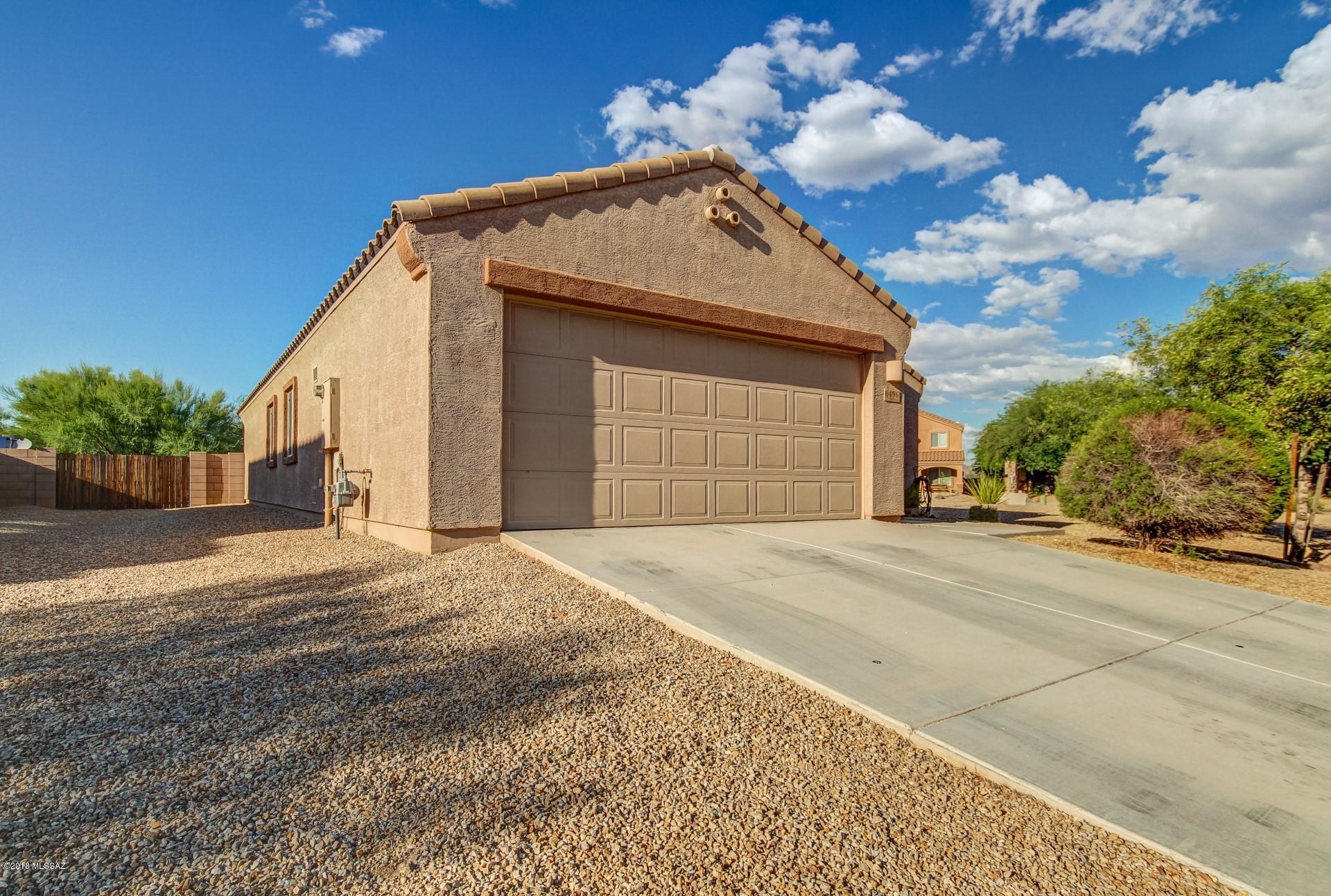 Lovely 3 bed 2 bath + den, 1610sqft home in a corner lot available in quiet southwest Tucson neighborhood is a must see! Conveniently located within easy reach of Casino Del Sol as well as Sonoran wilderness, this home is a desert dwellers dream! Inside you will find a bright and inviting living room witch opens directly into the kitchen and dining area. The kitchen offers marvelous countertops , a dish washing station island, and plenty of attractive cabinetry. Through sliding glass doors in the dining area, you have direct access to the spacious, enclosed backyard. With a large grassy area and plenty of room for a garden, you will find it easy to enjoy the Arizona outdoors! This home is priced to sell and will not be available for long.  Dont miss it!