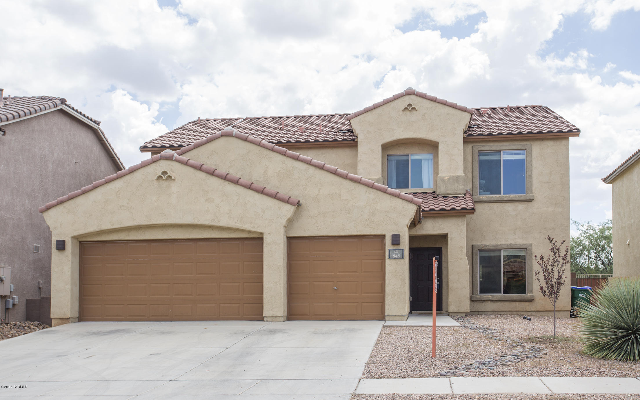 Huge 6 bedroom family home in the highly desired Rancho Sahuarita master plan community.  This house is all about space! All the rooms are large and open. Formal living, dining, family room open to a huge kitchen. Large downstairs master bed/bath. Upstairs hold 5 bedrooms, 2 full baths, and a large open loft/game room area. The house backs up to natural desert with no rear neighbor for privacy and views. Also includes a large 3 car Garage and solar power. Rancho Sahauraita has to offer: water park, pools, mini golf, basketball, work out room, trails, lake, movie nights and so much more! Priced to sell!