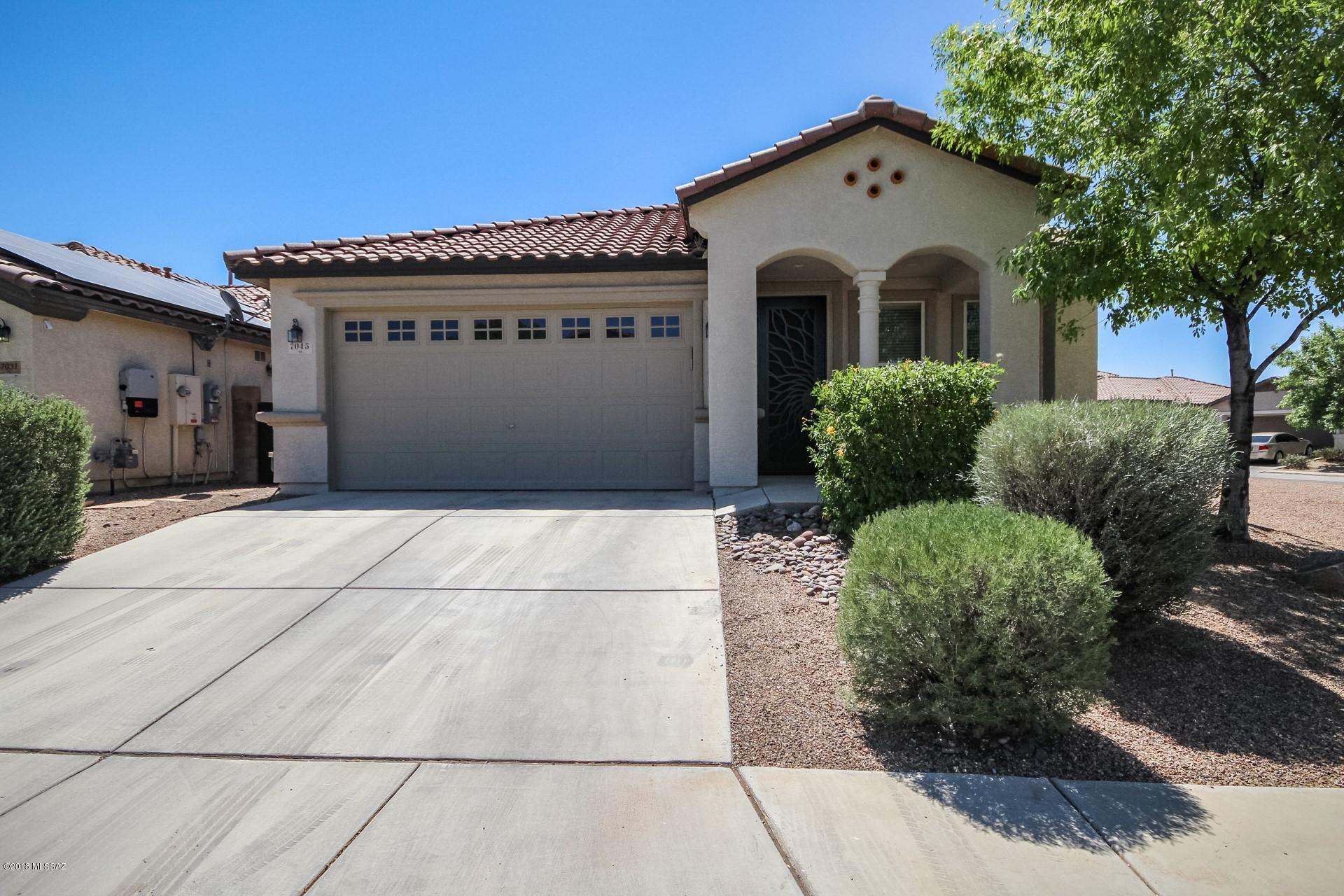 Your search is over! Well maintained Tucson home on a large corner lot with easy access to I-10! Move in ready with a flowing floor plan that offers a formal living room, family room, and four spacious bedrooms! Kitchen opens to the family room and features a plethora of cabinets, ample counter space, and a center island with breakfast bar. Each bedroom has plush carpeting and ceiling fans. Master includes a walk in closet and an adjoining spa like bath. Generous backyard has a covered patio, low care landscape, and room for the ultimate oasis!