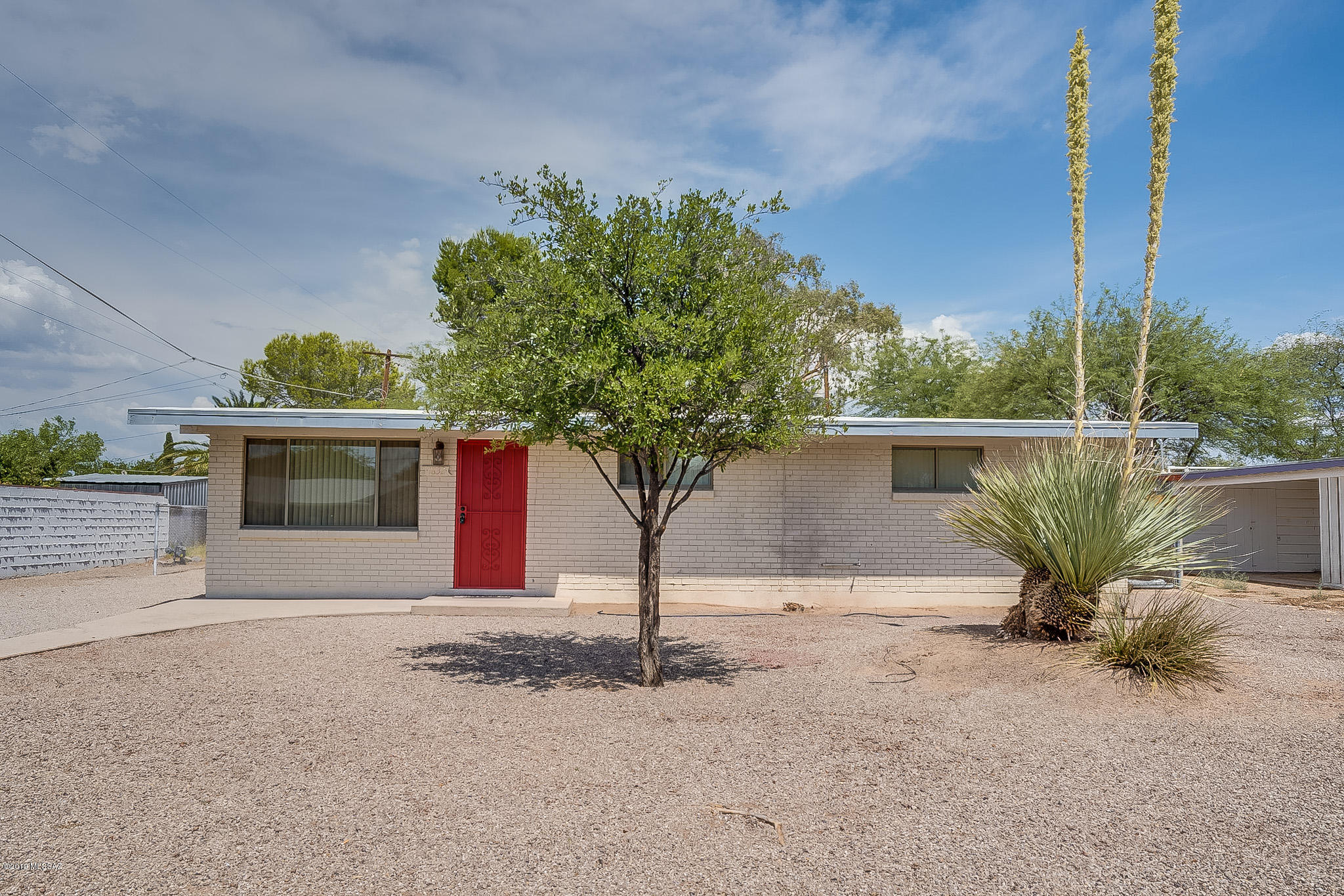 Can you say Awesome, Cute, Amazing, Fantastic and great deal? If not you will as soon as you see this house. 3 bedroom, 1-1/2 bath, with cold AC for the summer months ahead. Large backyard with Jacuzzi, sand box, dog run, garden, 5 fruit trees, large grass area all irrigated and a detached 1 car garage. Large galley kitchen with tile in main areas.... Central and Walking distance to TMC.. Don't miss out on this house.