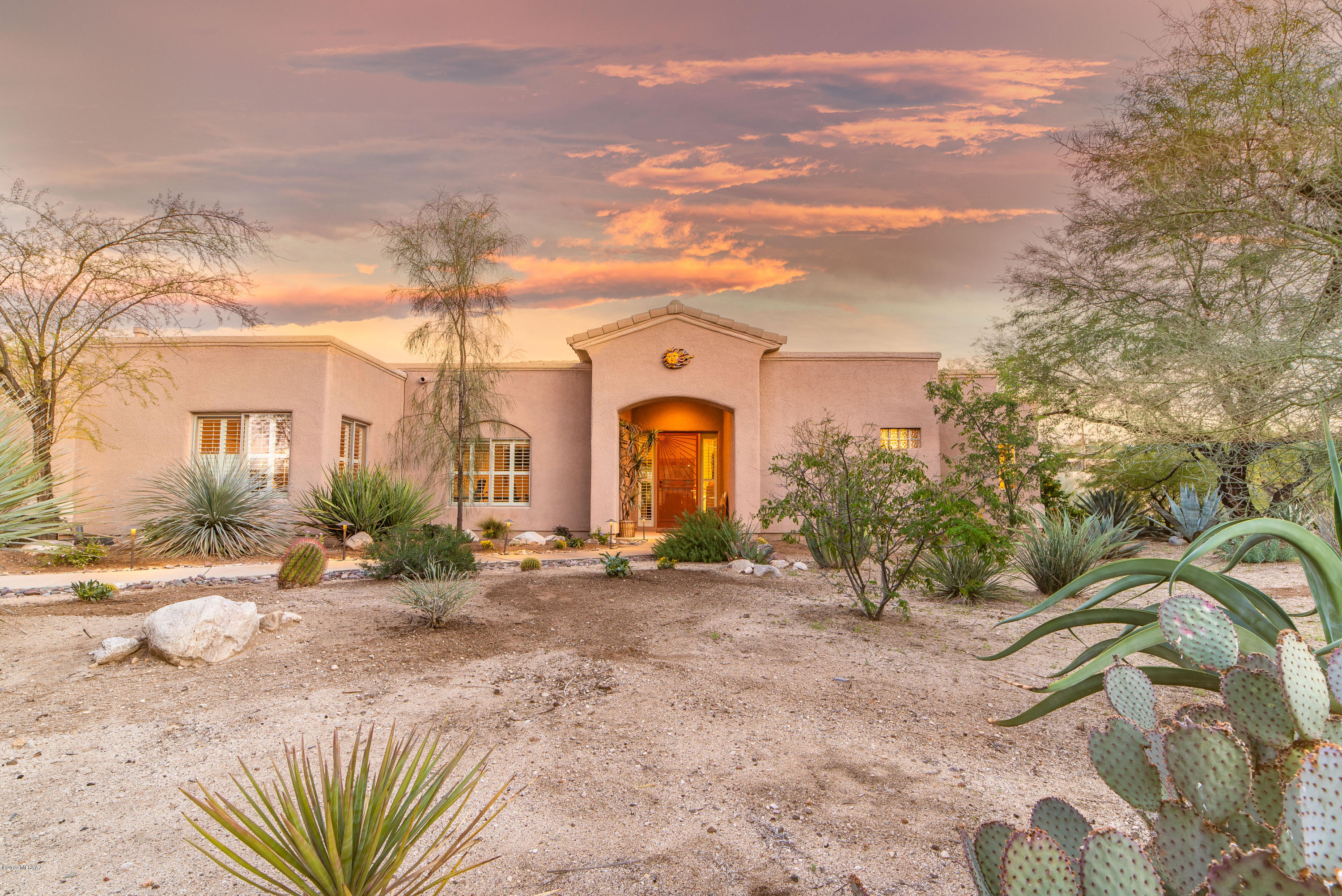 Here's Your Chance to Own Your Own Private Resort in LOGAN'S CROSSING. Arrive Home to Privacy on 1.05 Acres in the Middle of Oro Valley. Panoramic Catalina Mountain Views From Secluded Backyard. Get Ready to Love Your Master Suite Haven, Designed for Solitude. Ready to Take A Dip in Your Sparkling Pool or Soak in Your Hot Tub, Just Walk Out Back. Systems Through Out Home Have Been Updated & Maintained. Offering  Custom Baths,  Kitchen,Granite/Marble/Concrete Counters, New Wall to Wall Carpet, Ceramic Tile, New Washer & Dryer, Newer Roof, Water Filtration System, Hot Water Re-circulation Pump.  Location of Home is Just a Short Distance to Golf Courses & Other Oro Valley Amenities. Special Details of This Home Should Be Enjoyed by You. Most Furniture Available Under Separate Bill of Sale.