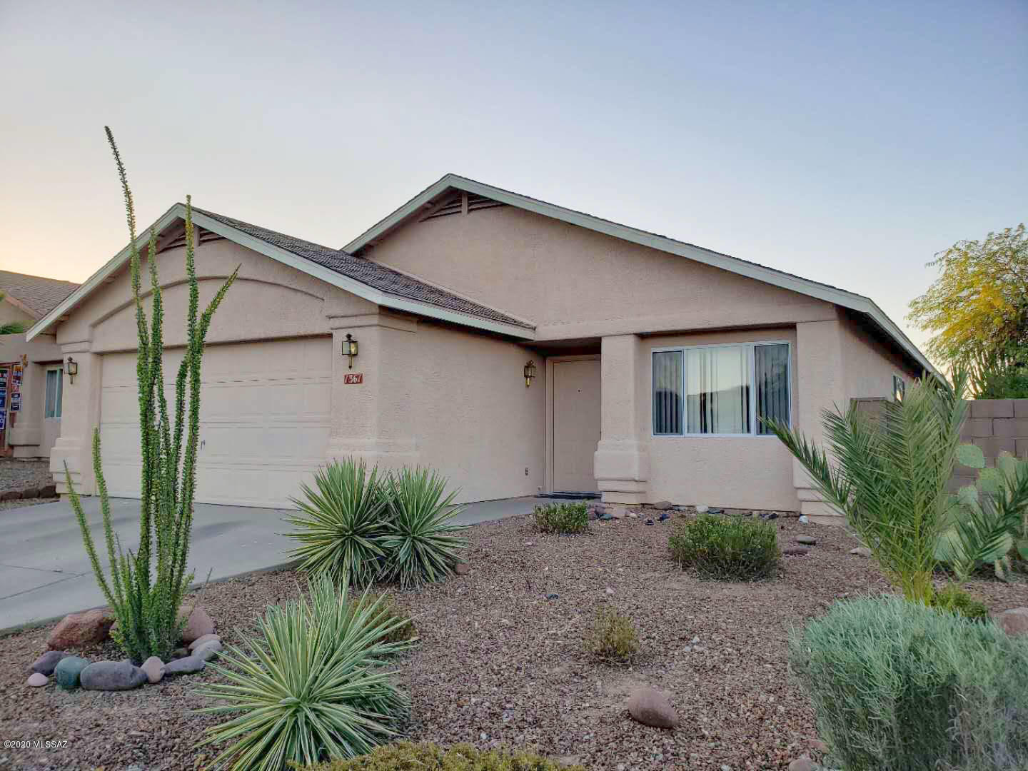 Wonderfully updated 4 bedroom, 2 bath home near the end of a quiet street on the West side. The home features vaulted ceilings and tile throughout with large carpeted bedrooms. The open floor plan has built-ins and upgrades including a built-in entertainment center with speaker system for surround sound. Home has ceiling fans, walk-in closet, garden tub and dual sink in the master, handicap accessible hall bath, breakfast bar and covered patio. Nearly new central AC. Close to Pima Community College, U of A, Downtown Tucson, dining, nightlife and entertainment. Minutes to Desert Museum, Old Tucson, Wildlife Museum, Art Museum, Saguaro National Monument, A Mountain and other area attractions. Close to St Mary's hospital & schools. Easy access to I-10.