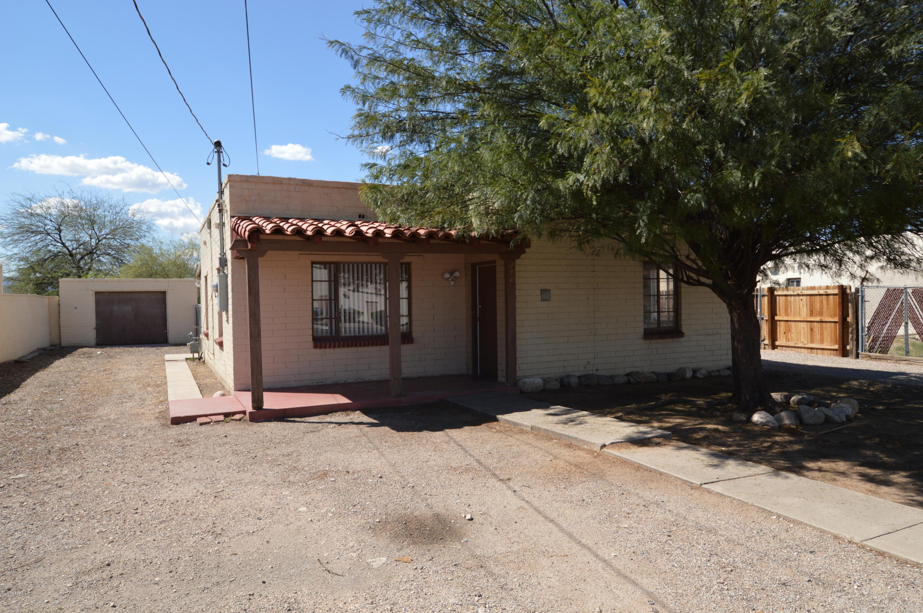 Terrific 2br close to UA and Pima Community College. Large fenced yard and detached garage. Ceramic tile throughout. Large utility room with washer/dryer hookups. Gas heat and hot water, very economical! Open and bright floorplan. Students welcomed! Pets upon approval and with deposit. This adorable home wont last, so CALL NOW!!