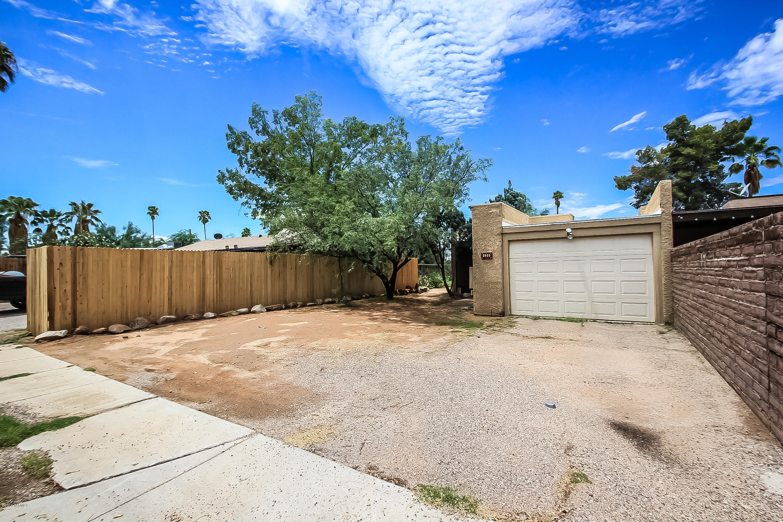 Beautiful midtown 2 bedroom town home! 2 full baths, double master closets, large bedrooms, multiple skylights throughout, garage with extra storage, new carpet, living room fireplace, all appliances stay, large laundry room and multiple storage areas.  Roof with 3 year warranty, gated front entrance, Blenman Elementary school, close to shops, super convenient location.  Must see!
