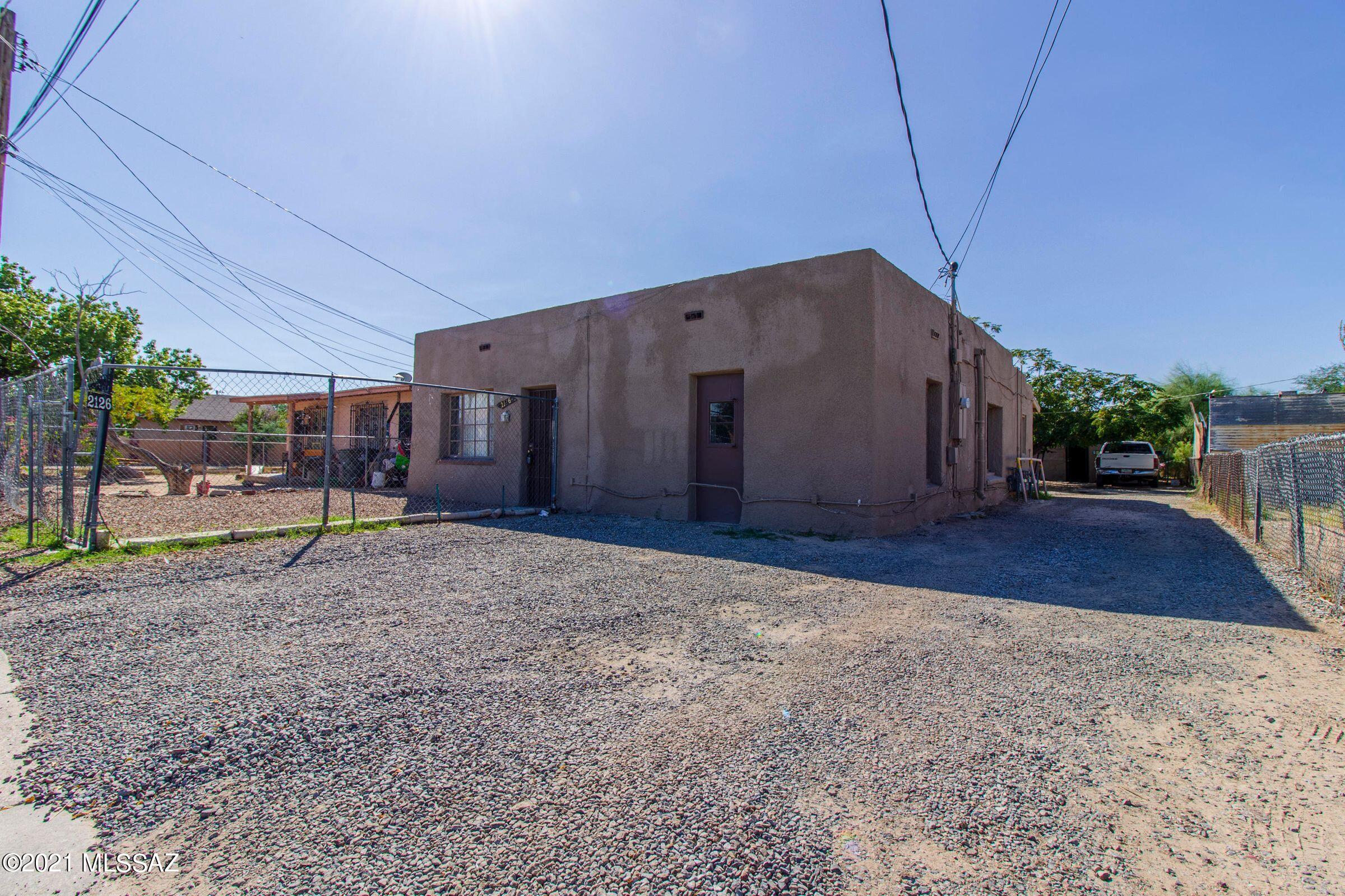 Great investment property. Home in front is charming 3 bedroom, 1.5 bath tile flooring throughout with washer and dryer hookups and private front fenced in yard. 
2 back units are 1bedroom 
1 bath units perfect rental properties. Dont miss out!