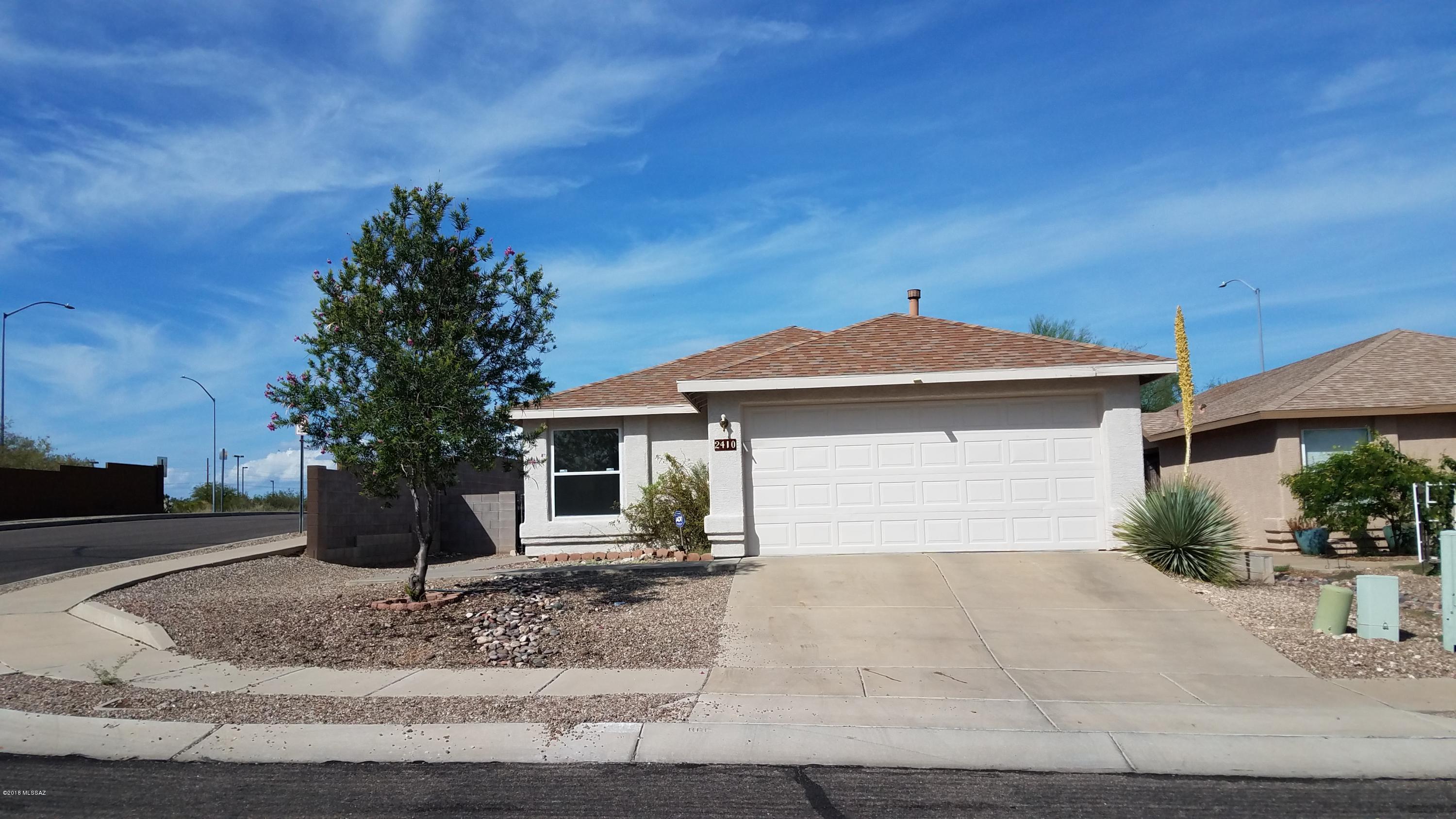 Wonderful opportunity to own this home located close to UofA, the new Costco, UofA Tech Park and with easy access to I-10 for a quick commute to other parts of Tucson.  The home offers 3 bedrooms, 2 full bathrooms and a 2 car garage.  All located on a good size lot with backyard enclosed with block wall. The great room is spacious and has vaulted ceiling. One of the bedrooms is located towards the front of the home with the master located in the middle and the 3rd bedroom in the back. Don't wait, come see your new home today.