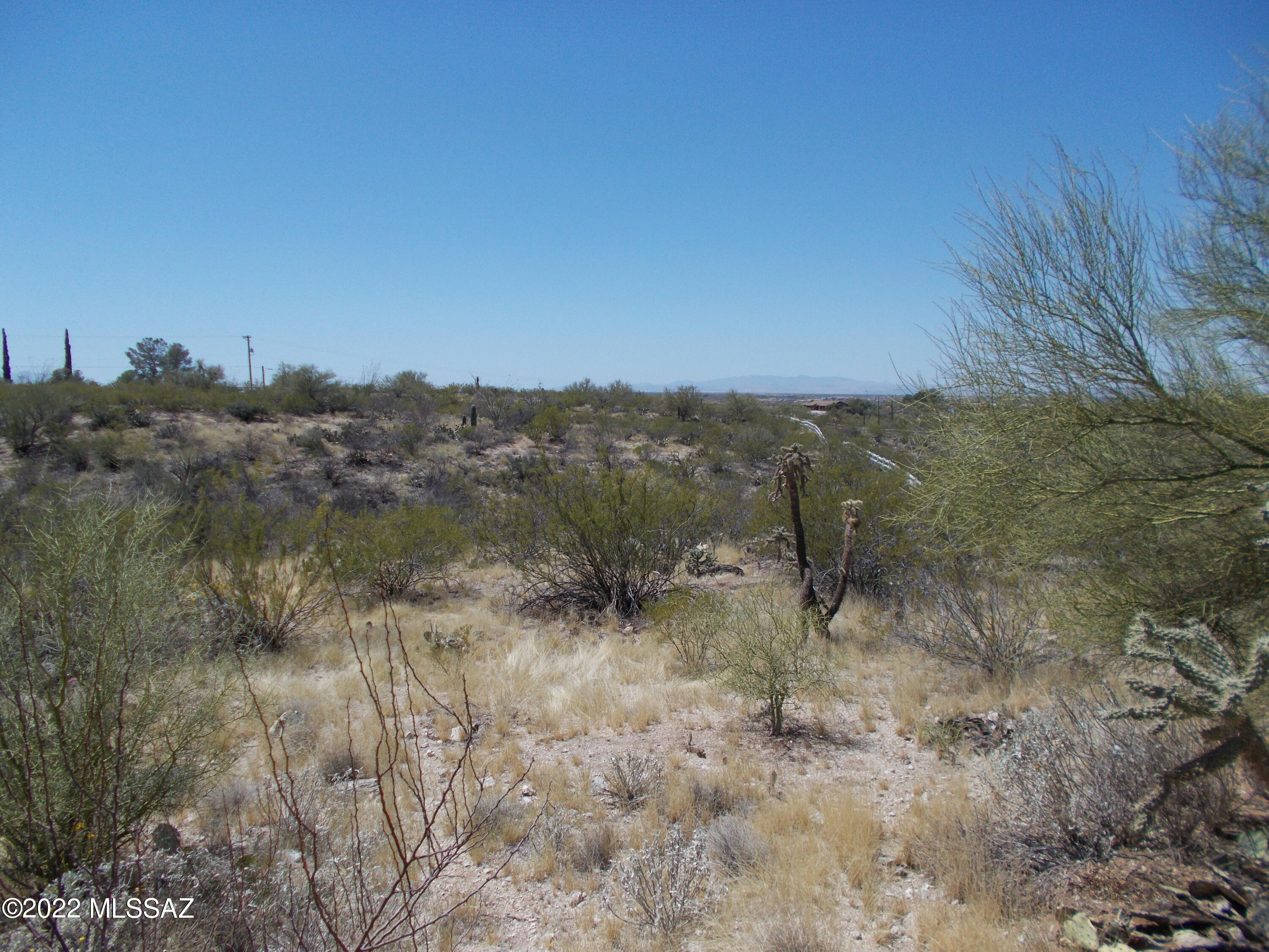 Enjoy the views of all surrounding Mountain ranged from the high, level, and large, western portion of this 3.3 acre, gated lot on the sought after 7 rarely available east side of Tucson. Located minutes from all the outdoor recreational opportunities Saguaro Park East has to offer. This intimate, 11 lot subdivision has a lovely rural feel yet is conveniently located to all your needed shops, services & facilities. Horse friendly area with white picket fence along all property lines, all utilities in the road(septic required) in the award winning Tanque Verde School District. No surprises, Neighboring parcels are built with high end custom homes. One of the few good, AFFORDABLE LOTS left. See Documents for perc test, utility maps, SPDS, etc. East to walk & show -  DON'T WAIT.