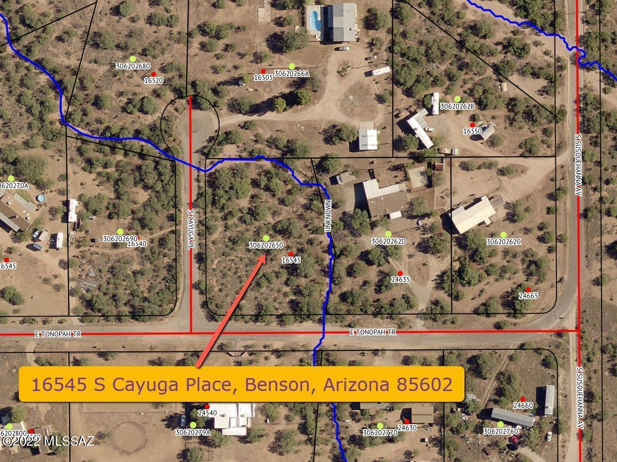 Located in this quiet neighborhood away from the hustle and bustle of city life, you'll enjoy beautiful mountain views as well as awesome Sonoran Desert Sunsets. This 1.2 acre parcel is flat with power available but not to lot, propane, septic required, and drill well, haul water or see about a possible well share agreement with a neighbor. Situated in this beautiful natural setting surrounded by native vegetation of the Sonoran Desert. There is new development in this area with newly paved streets throughout the neighborhood and many new homes. Located a few minutes south of I-10 on exit 297 (Mescal-J-6 Ranch) just 45 minutes southeast of Tucson, Arizona for shopping, fine dining and entertainment and only 14 minutes from Benson, AZ. with Walmart Supercenter. Owner/Agent
