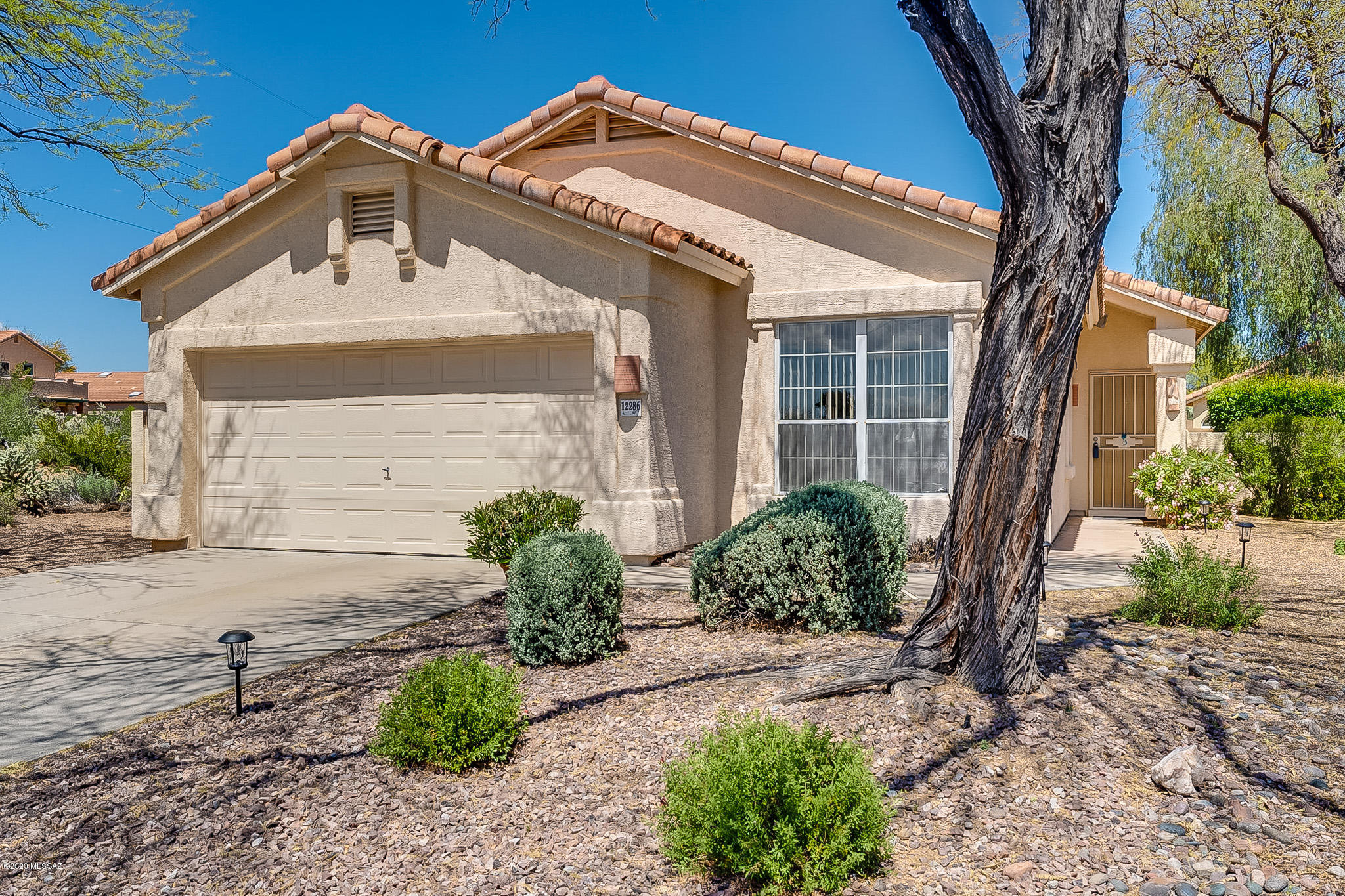 Back up offers accepted.  Quiet cul-de-sac location and property borders the common area with a great walking trail.  Large lot! Nicely landscaped front and back yards.  Citrus trees!  Mountain view in the backyard.  East facing covered patio for outdoor living. Step inside and you will discover new flooring, freshly painted interior and a new hot water heater.  The tall ceilings and abundance of natural light gives the home a spacious feel.  3rd bedroom is versatile – could be a den or office or home gym.  Altogether a nice package!
