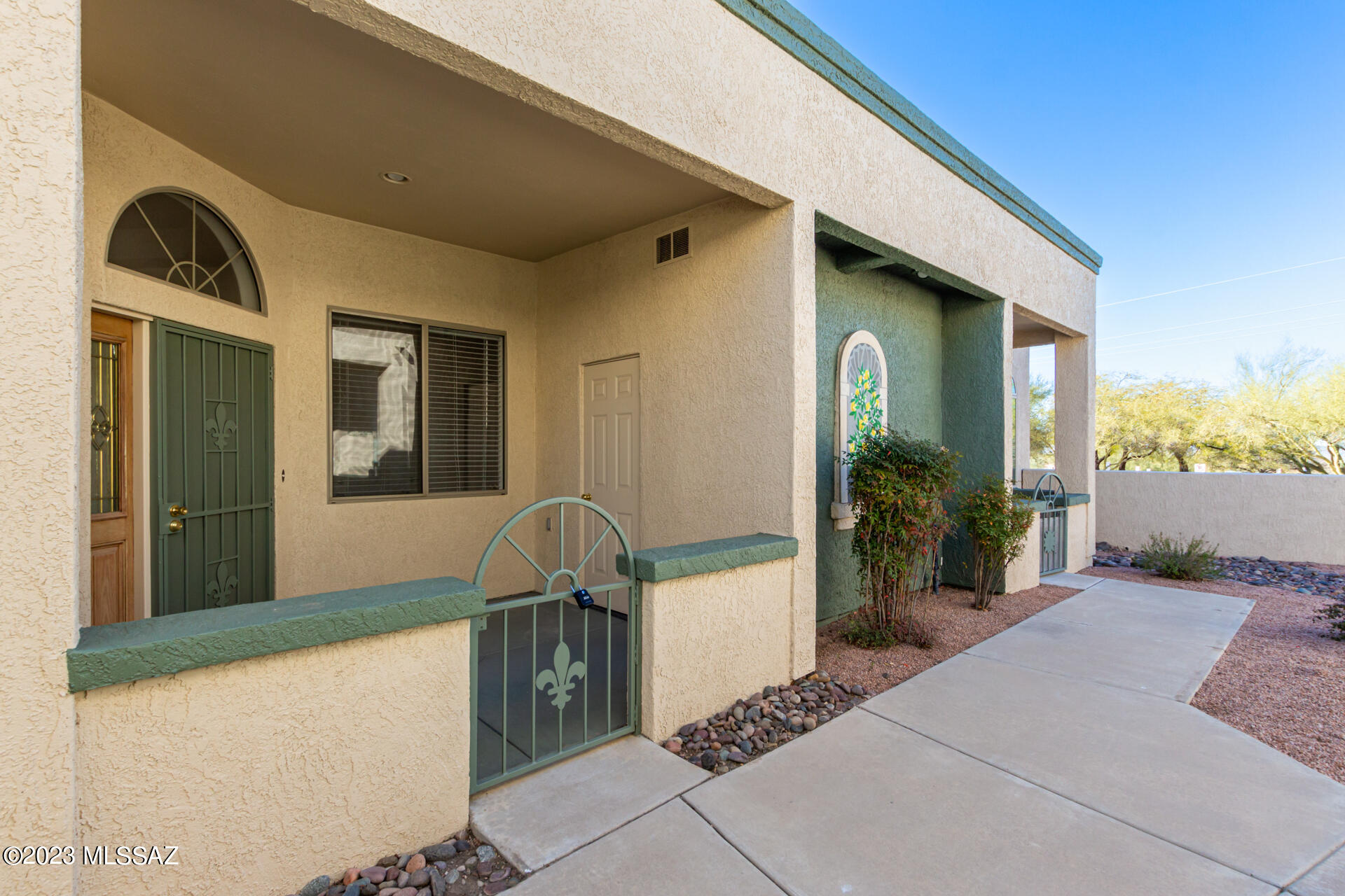 Look no further! This charming 2-bed, 2-bath residence with a welcoming porch is the one! Nestled in the 55+ adult Community of Mona Lisa Village, this home is conveniently located near restaurants, shopping, the YMCA, & parks! You'll find a lovely interior w/ a living room showcasing high ceilings, wood-look flooring, & arched windows. The spotless eat-in kitchen enjoys ample wood cabinets, built-in appliances, recessed lighting, & a peninsula w/ a breakfast bar. The bright main bedroom boasts a walk-in closet, backyard access, & a private bathroom for added comfort. Relax in the backyard, offering a patio w/ an excellent view of the neighborhood. The wonderful Community amenities include a refreshing pool, recreation center, parking spaces, and more! Fabulous value!!  Owner/Agent