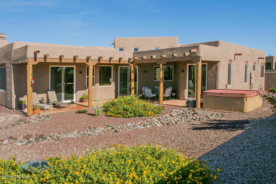 Incredible views surround this stunning home. All bedrooms zoned for complete privacy. Gourmet kitchen, open and perfect for gatherings. Custom wood beams throughout living room. Large back yard with built in kitchen and fireplace. Enjoy the mountain views by day and the incredibly clear nights studded with starry skies. Fully wired workshop in the backyard. This home has everything you are looking for.