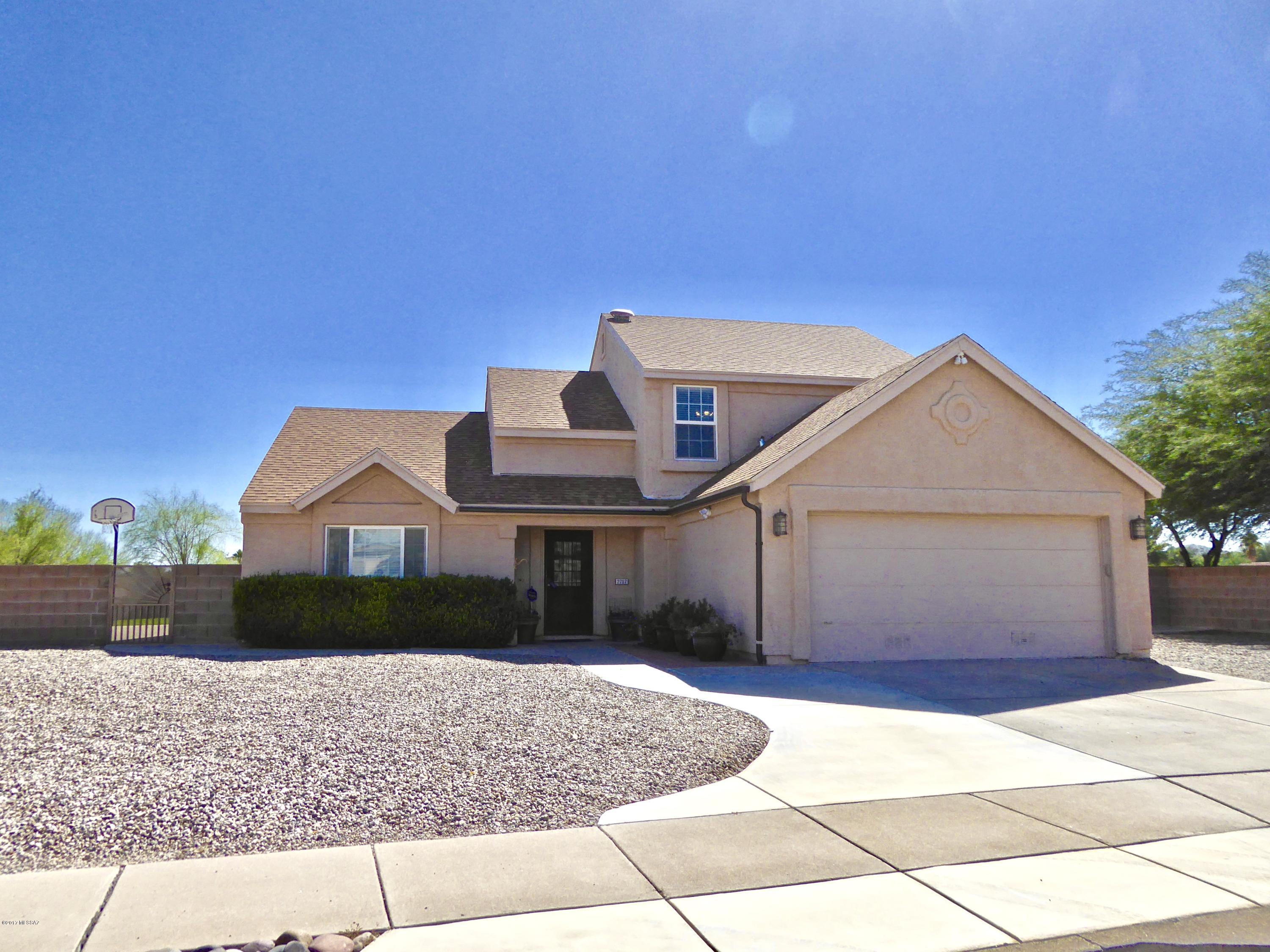 4Br/3Ba 2 Story Contemporary on the Best Lot in Saddlewood Ranch. Over 1/2 acre backing to and overlooking a desert riparian area. Panoramic views; city to mountain, from the expanded covered patio. 2nd story observation deck with dramatic views. The Master is downstairs with full bath and door to rear patio. Vaulted ceilings, wood laminate flooring in traffic areas, ceramic tile in the spacious laundry room and all baths. Brick hearth fireplace. Lots of storage. Wall of cabinets in laundry room. Upgraded low E windows. Alarm System. Garage has drop-down ladder with attic storage. Brand New HVAC - Oct. 2017! Much of the large 1/2 acre lot is fully block-walled in with drive-through gate for all the toys; boat, trailers, RV, etc. The roof has had the south slopes just re-shingled (Oct). The remaining sections were reroofed about 4 years ago. Truly for the Buyer who wants quiet privacy with the convenience of being close-in to everything. Don't miss this one-of-a-kind well maintained home!