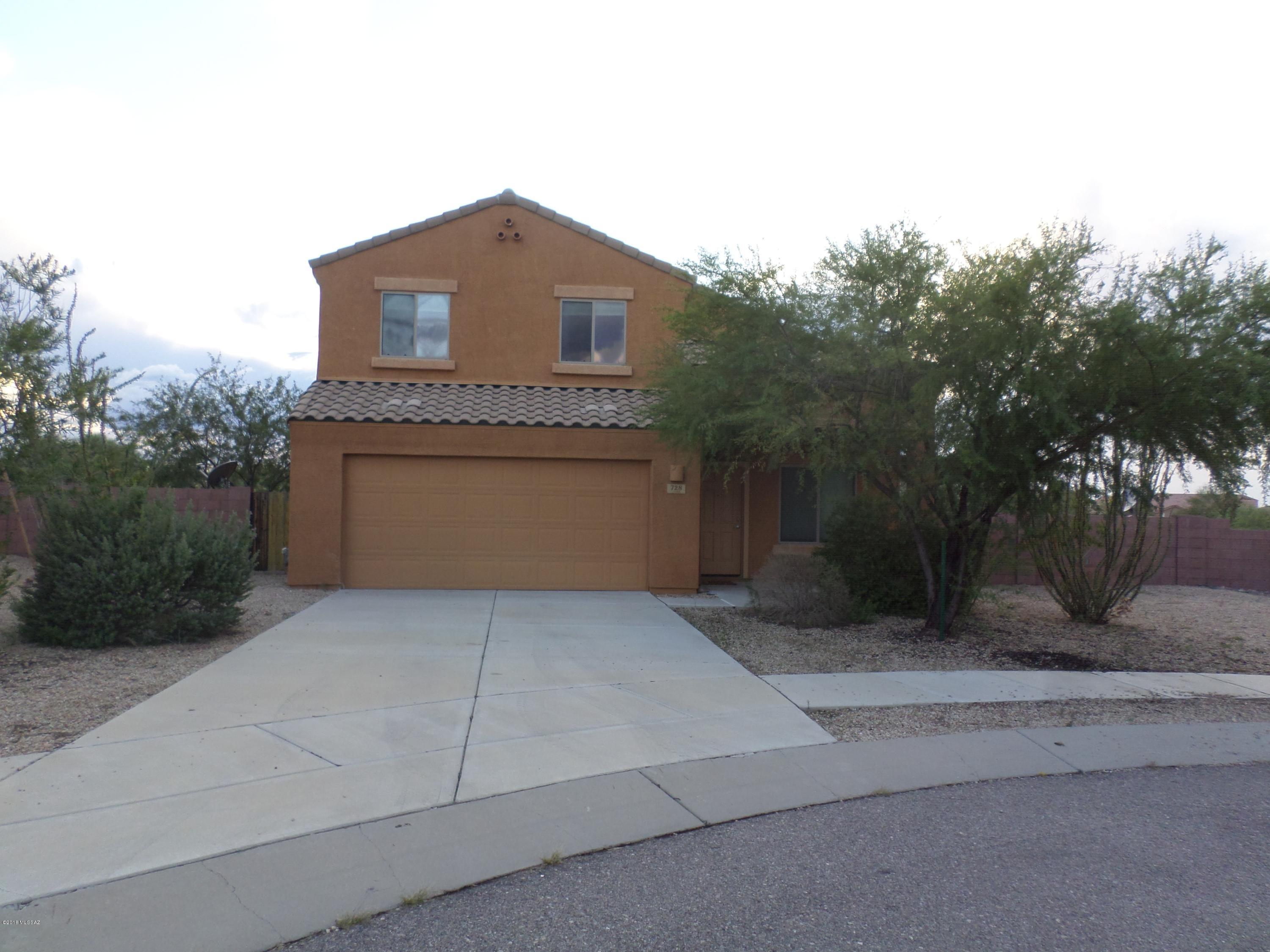Fantastic 2 story - 3 bedroom/2 bath home with all of the extras. This beauty offers a spacious, bright floor plan with neutral palette. Ground floor with formal living/formal dining rooms, guest bath, kitchen with granite counters, all appliances, oversized panty, breakfast bar. All bedrooms are located on the second floor with a private loft. Low maintenace backyard that backs up to natural desert, wrap around pavers/patio with ramada - perfect for entertaining. Cul de sac lot, freshly painted, all tile flooring (bamboo in entry), ceiling fans throughout, A/C, 2 car garage, washer/dryer and so much more! Vail School District.