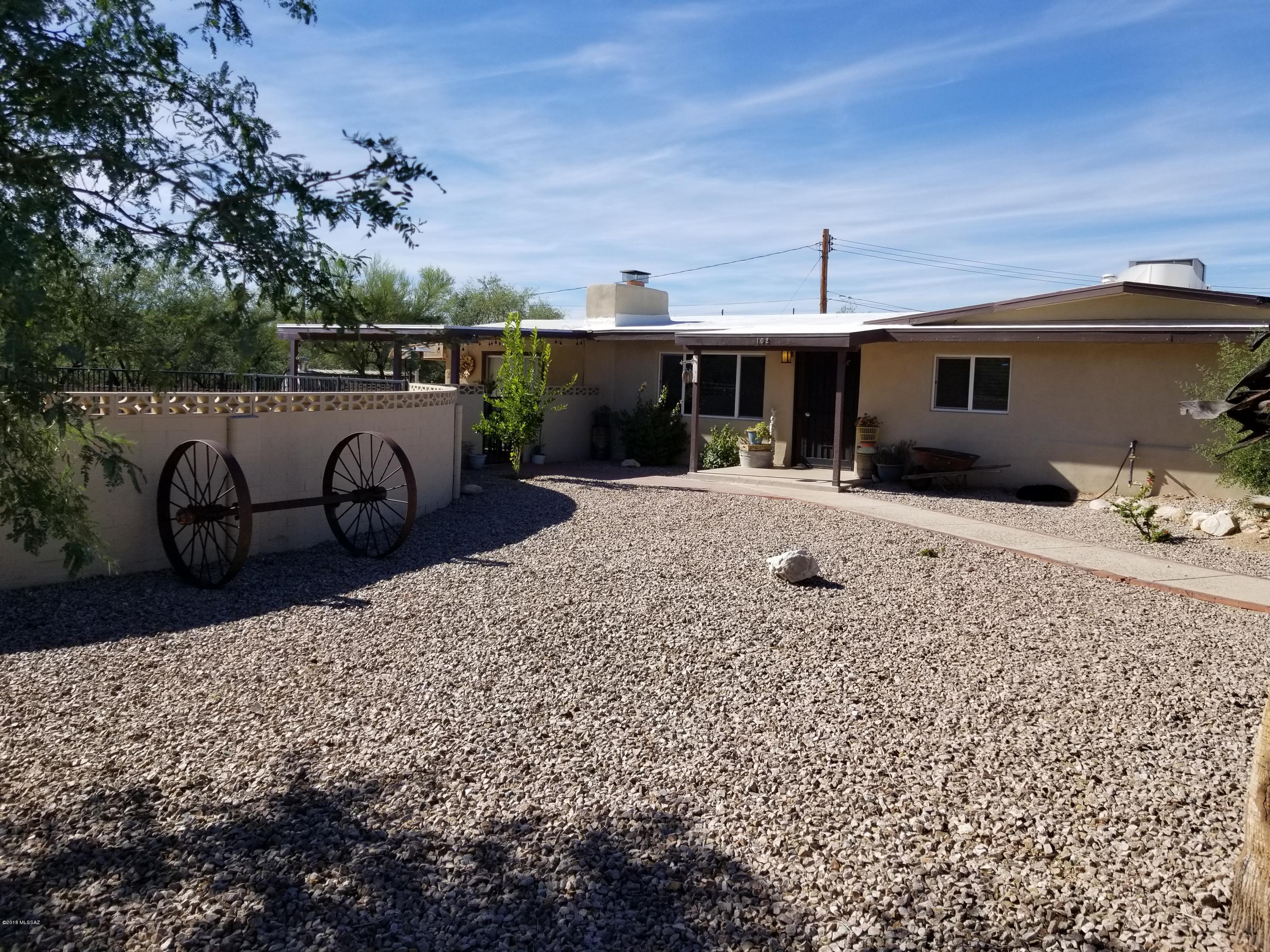 Beautiful 3 bdrm 2.5 bath home located in popular NW neighborhood.  Single story large lot with no HOA, lots of room for RV and toys.  A split BD floor plan.  Large corner ACRE lot nestled in a private natural setting that provides for quiet country-style living - yet close to everything!  Amazing MOUNTAIN VIEWS from the rear patio/pool area.  Cozy fireplace in the living room.  Bright open kitchen with loads of natural light that includes granite counters, center island & stainless steel appliances.  Large BDs for all, to include a huge private master suite with ample closet space and access to the rear patio.  Covered rear patio and large paved patio adjacent to the pool for outdoor entertaining.  This home is immaculate and a must see!