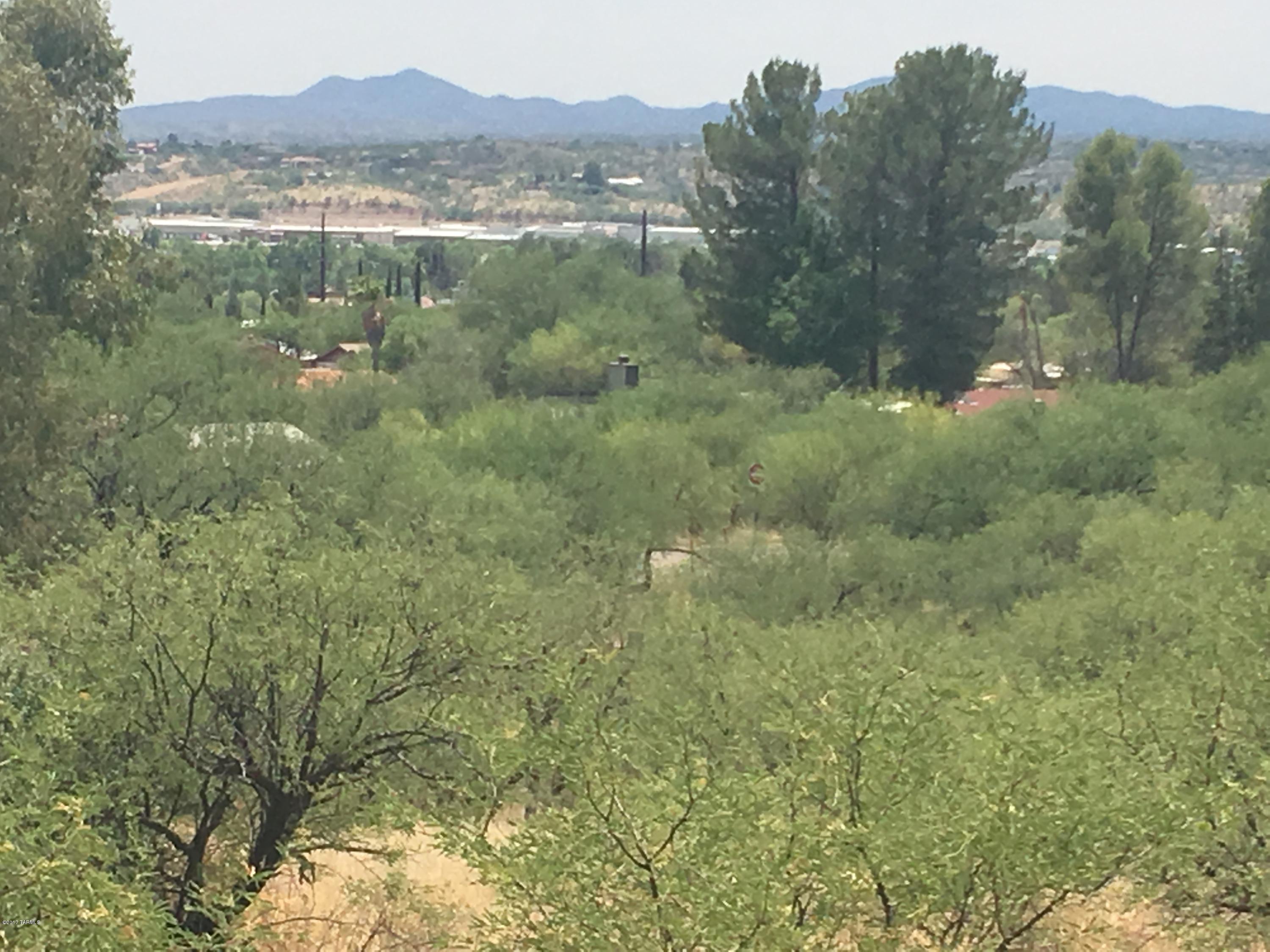 Nice building lot in Rio Rico with good views and paved road. This area has street lights and underground electric, gas, water, sewer, and cable.