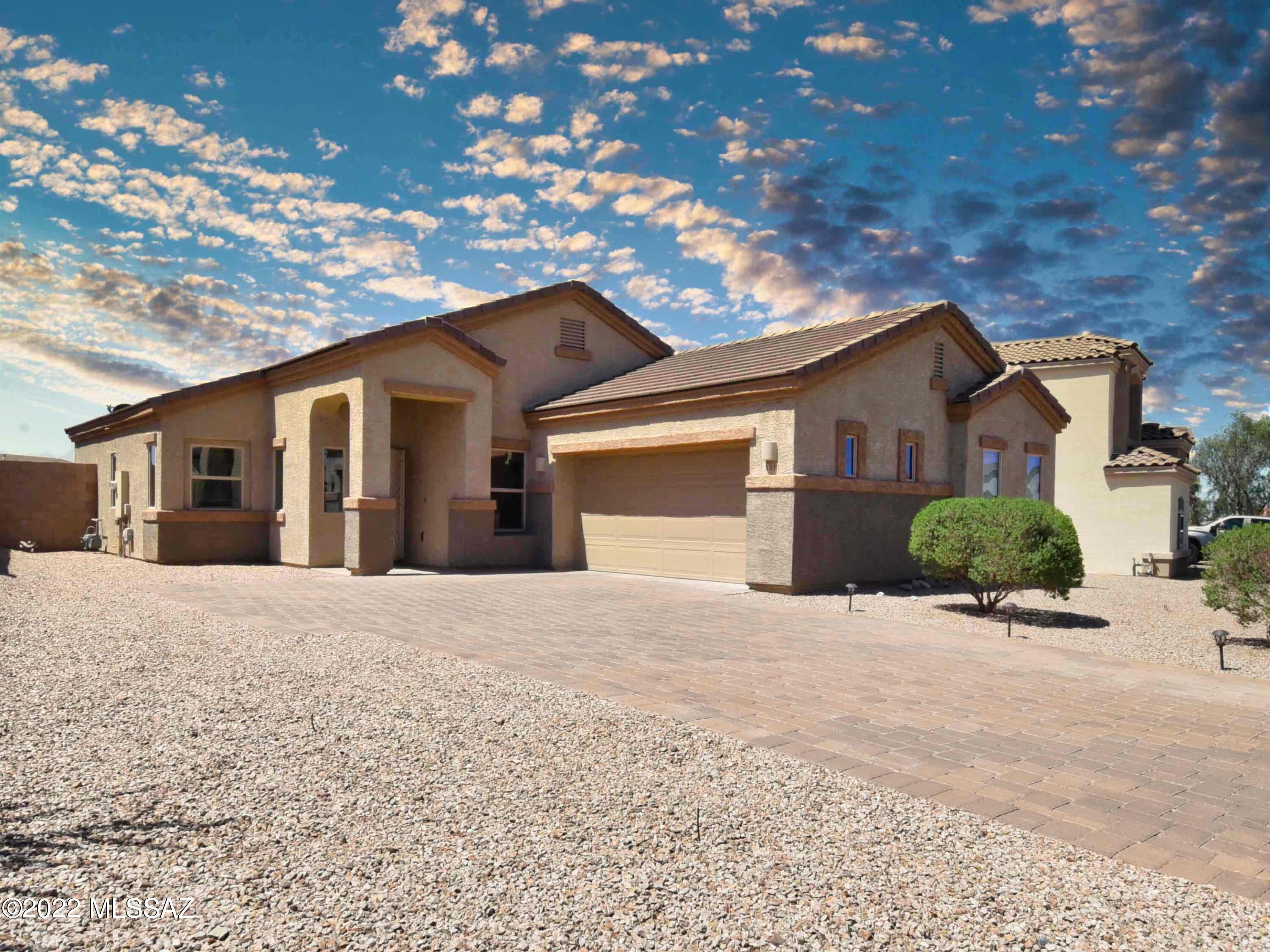 Enjoy the beautiful views of the majestic mountains and sunsets this lovely home has to offer. Ready to move in and has over sized living spaces. Relax in your backyard with your oversized spa. Garage is ready to become your play ground with epoxy floors and room for tools.