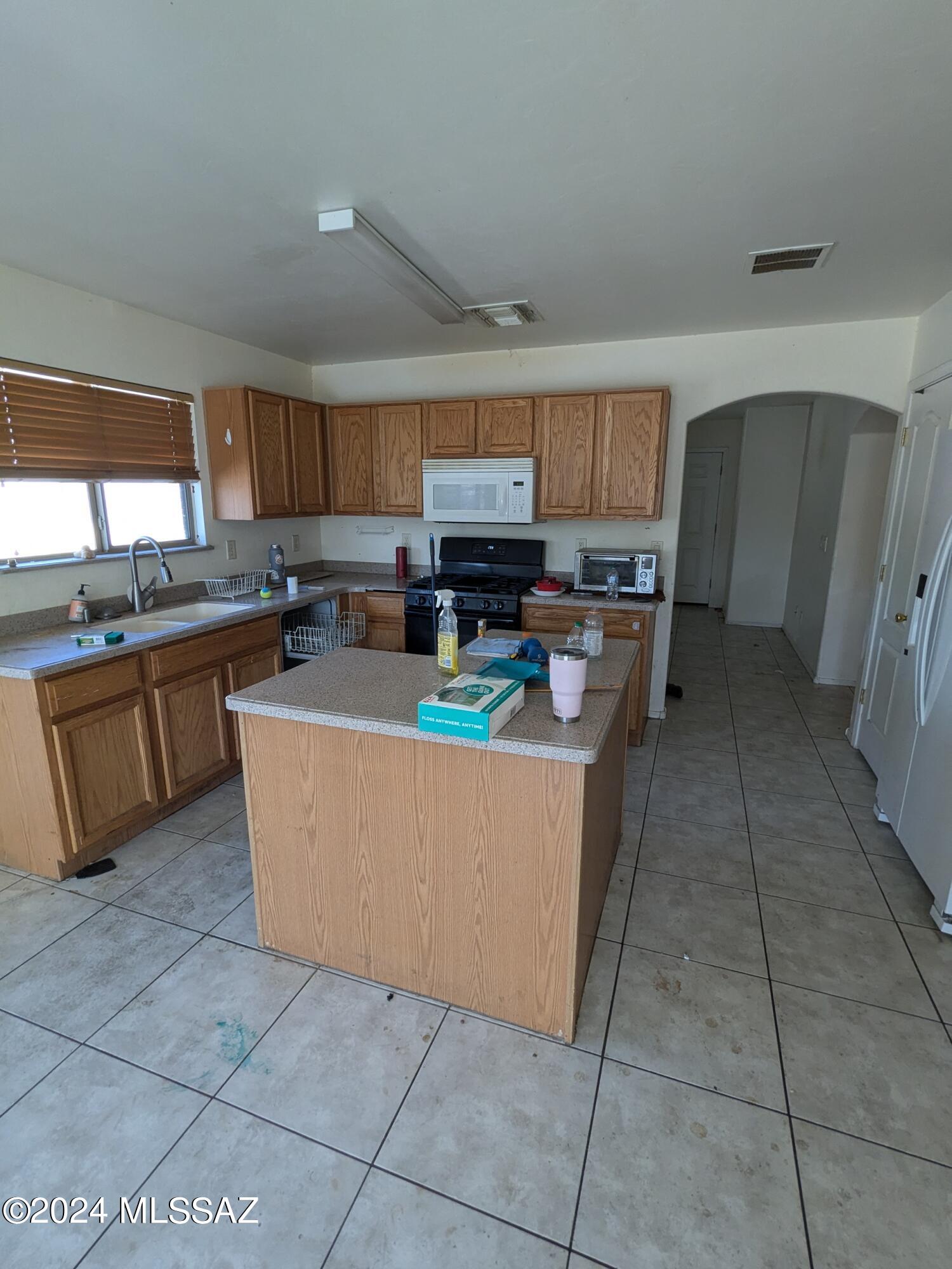 GREAT FIXER UPPER OPPORTUNITY!! Get a great deal by doing some of the clean up and upgrading on your own. Qualifies for an FHA 203K Renovation Loan Program Contact now for more info!!