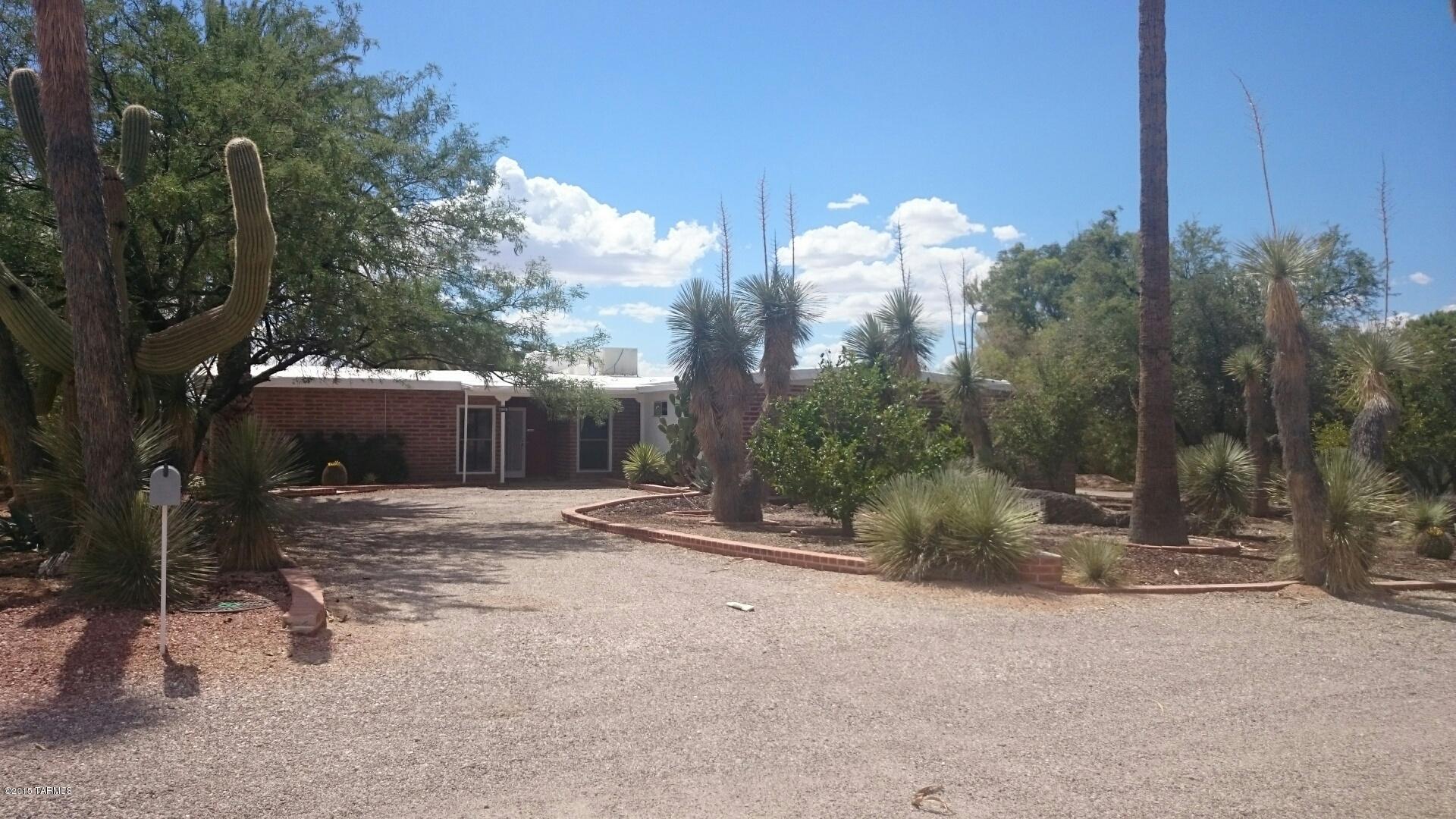 If you are looking for a home full of character - look no more.  This is it.  No HOA to deal with.  On .8 acre. No carpet. Small studio separate from the house. Plenty of storage. Tenants may subscribe to a neighborhood pool for an annual fee.