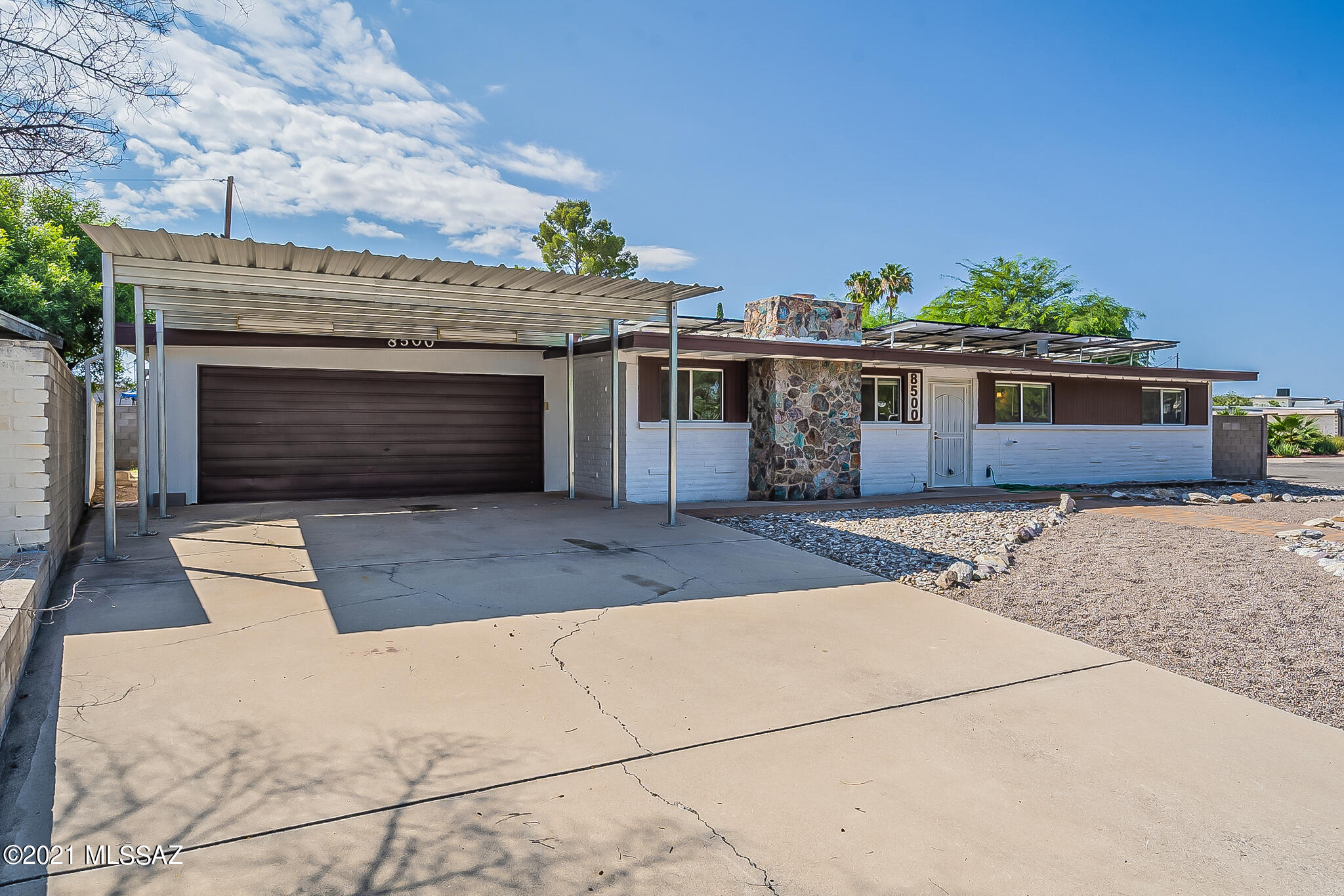 Welcome to Desert Steppes Estates Community!  This beautiful home is conveniently located East Tucson sitting on a corner lot to provide much privacy.  It offers 3 bedrooms/2 bathrooms, bonus room off of Owner's Suite and workshop/office off of garage.  Separate living room and family room to provide full enjoyment of the home! It is completely move in ready with upgraded electric panel and recently painted both interior and exterior.  In addition, save a lot of money on electric bill with with 8.7 KW solar system at the house!  This home is near Davis Monthan Air Force Base, shopping, groceries, restaurants, and so many greatly places.  Come and visit this home today to make it yours!!!