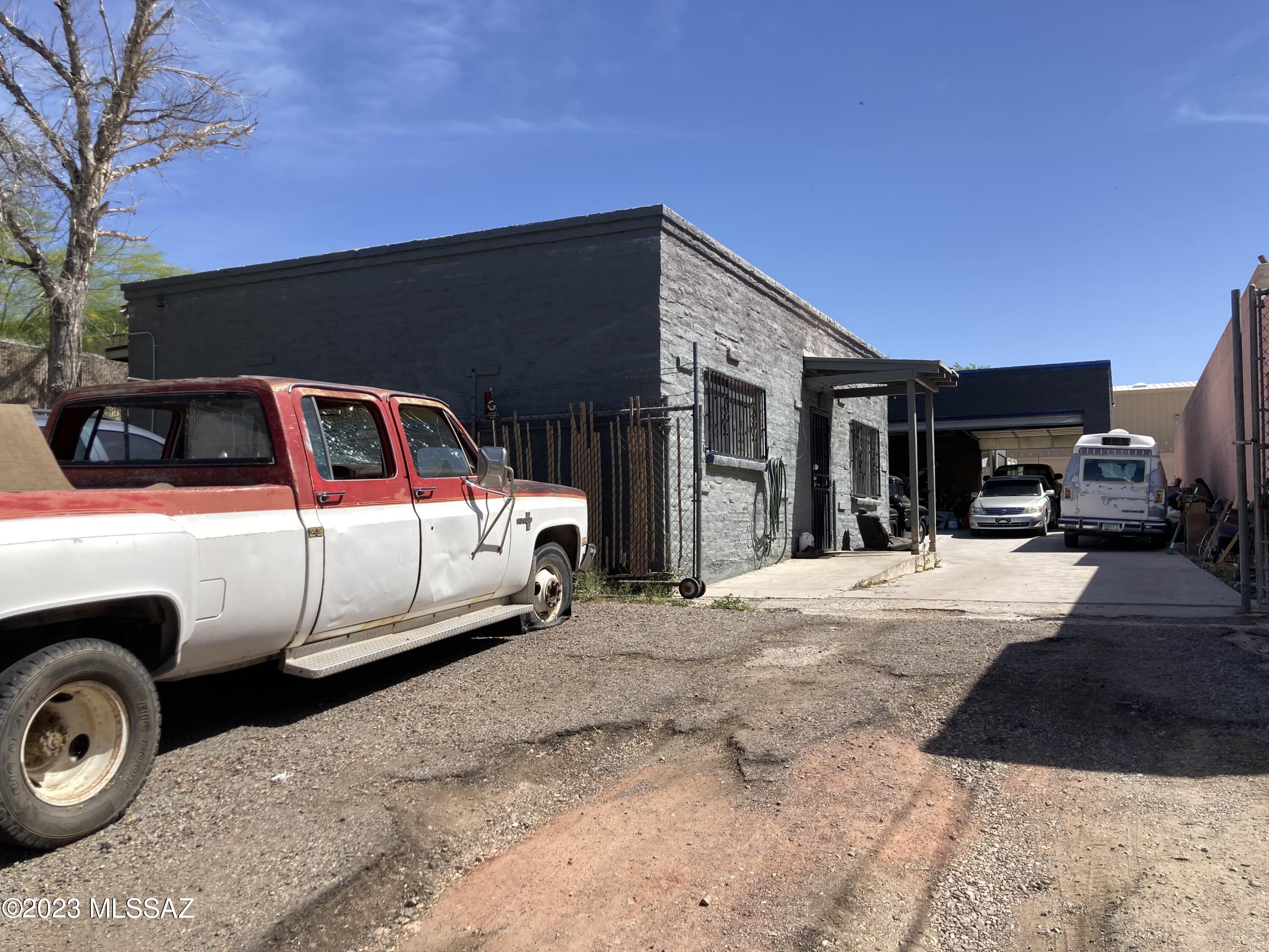 Zoned C2 - in commercial neighborhood just off Grant & Stone - end of dead end street- two buildings - front residential tenant - 804 sq ft built 1950 - rear currently used as body shop - 2200 sq ft - 3 bays plus with overhead doors.  Separate tenants.