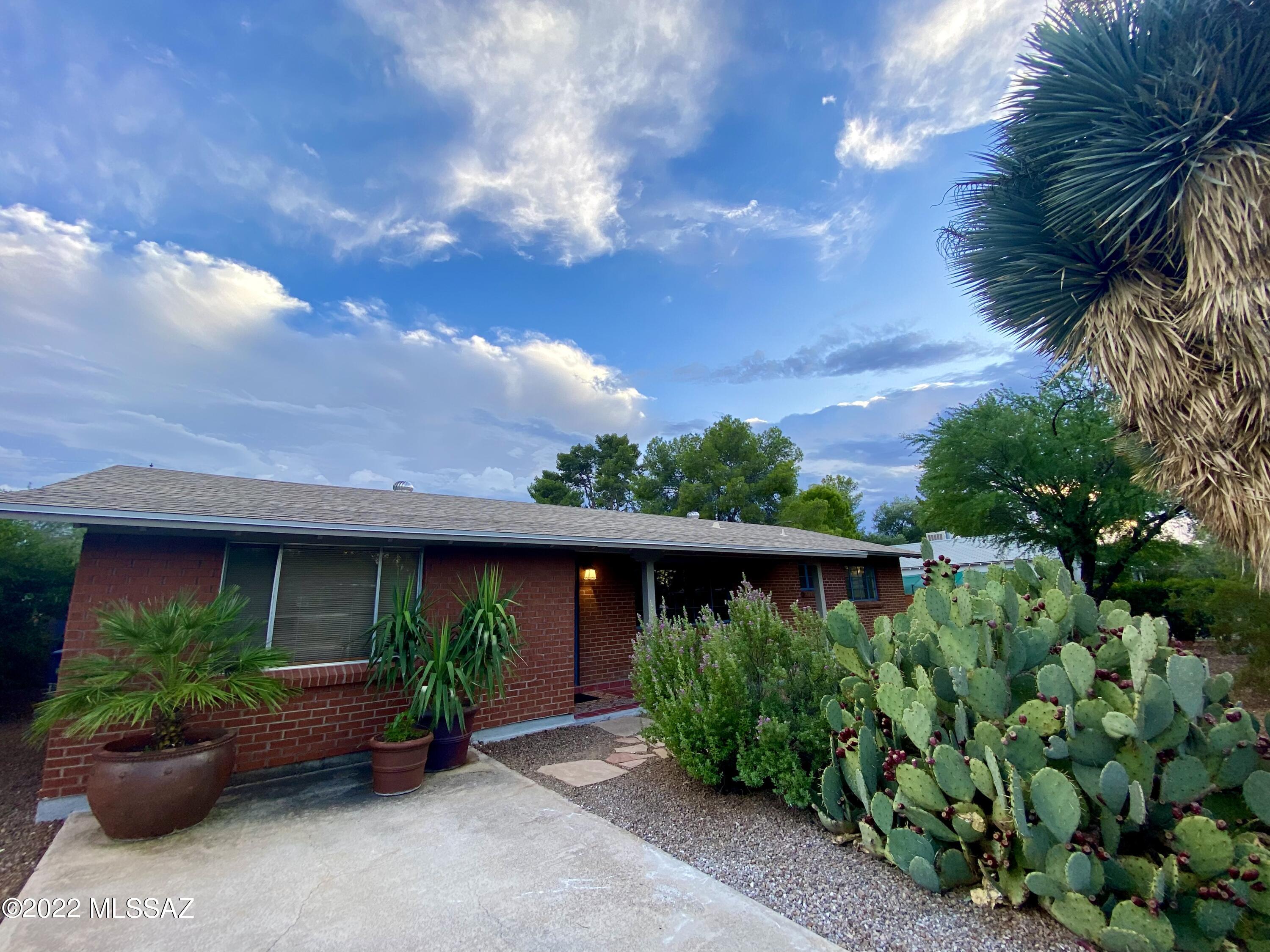 Are you looking for a mid-century ranch home in a sought after central neighborhood? This red brick home is located in the well known La Madera Neighborhood. The neighborhood has larger mature lots, unique homes and one the best neighborhood parks you'll find in Tucson. The home sits on a quiet street, has a large backyard with room for a pool or guesthouse. Inside you'll find the floorplan to be super functional, the living spaces are open and it has a twist of character with the cove ceilings. Roof is a year old, extra insulation has been added in the ceiling, washer/dryer and HVAC all newer. Treat Avenue Bike lane is almost finished and runs right by this property, perfect for you cyclists. The nearby park has everything you'd need at a park, make sure to check it out when you view the home.