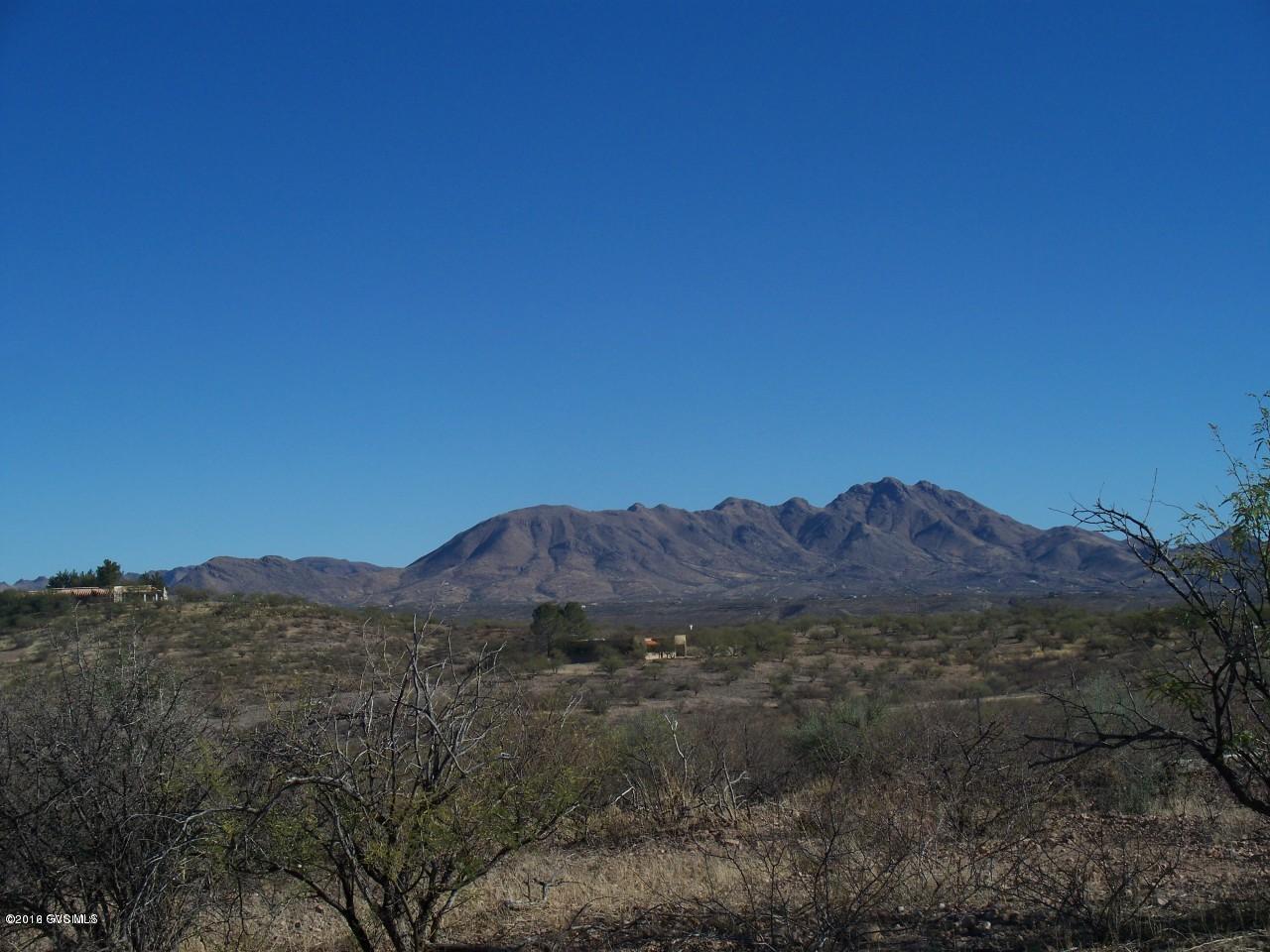Incredible views overlooking Tubac and the Santa Cruz River valley! This lot is on 6.25 acres with a well! Build your custom home here and have breath taking views of the Tumacacori and Santa Rita Mountains!