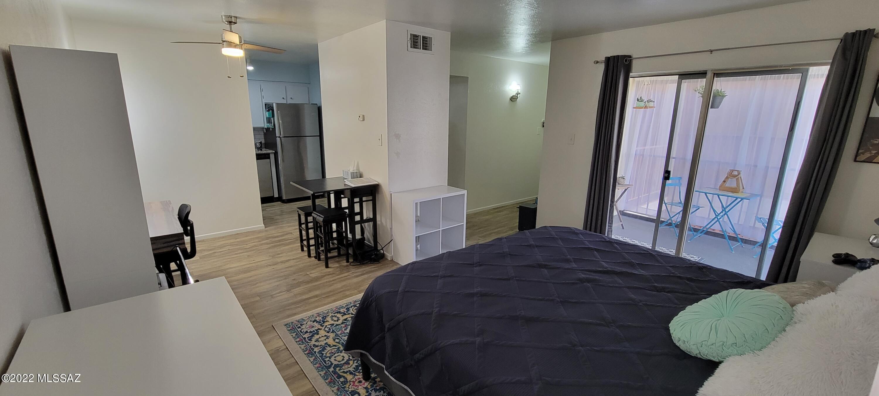 Welcome home to Las Colina Condos! Studio living at its best. Wood laminate floors, granite counters, all new stainless appliances, Under sink water filtration system, Subway shower tile, everything has been touched/updated. Plenty of storage with a huge closet with built-in shelves and plenty of room, linen closet, kitchen pantry, and separate office/study/dining space. This is an upstairs unit, which will be more private and peaceful. The  enclosed patio affords sunset views and brings lots of light to the unit. Laundry, mail, and the swimming pool is just a short walk from the unit. Close to shopping, transportation, restaurants. Come see why Las Colinas is such a pleasant place to live. Enjoy!