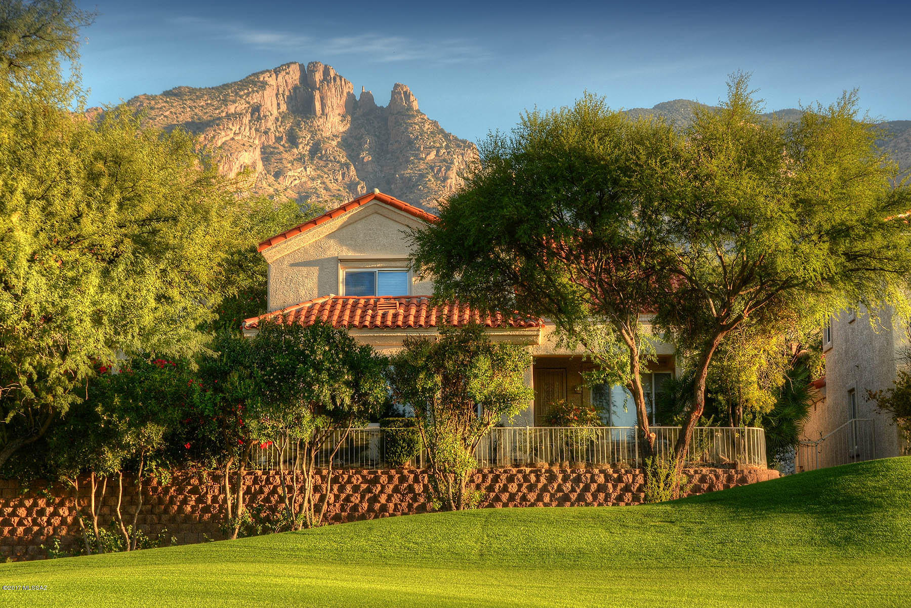 Gorgeous, gated La Paloma community!   Updated 3Br 3BA patio home on the golf course! Right next to Ridge 2 green.   Beautiful city, mountain,golf course views!   No poly pipes. Newer HVAC. Brand new kitchen countertops and SS appliances! Brand new flooring downstairs!   Quiet, peaceful living. Wonderful inviting bricked patios.  Listing agent related to sellers.