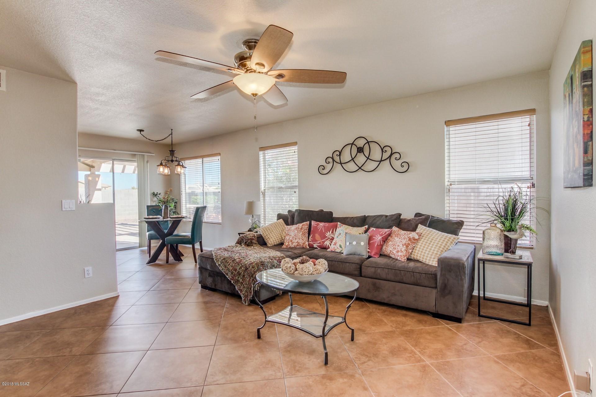 Seller will accept or counter offers between $209,900-$219,900. Beautiful & well maintained home in the desirable northwest community of Continental Ranch! This spacious 3 bedroom / 2 bathroom PLUS loft home features fresh interior neutral paint, new carpet, ceramic tile and ceiling fans throughout. The kitchen features lots of storage space, granite countertops, gas range and eat in breakfast nook! The large master features an en-suite with dual vanities and private toilet room. The back yard is spacious and private (backing to a wash) and has a ton of potential! NO POLY PIPES! Schedule your showing today, this home won't last long!