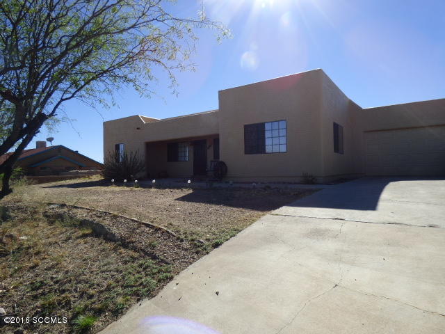 Beautiful Southwestern home on a corner view lot features 1501 square foot home with 3 bedrooms, 2 baths, fireplace, split plan, wonderful back yard, double garage. All-electric home on 1.18 acre lot. Includes refrigerator, clothes washer and dryer too! Call listing agent for appointment.