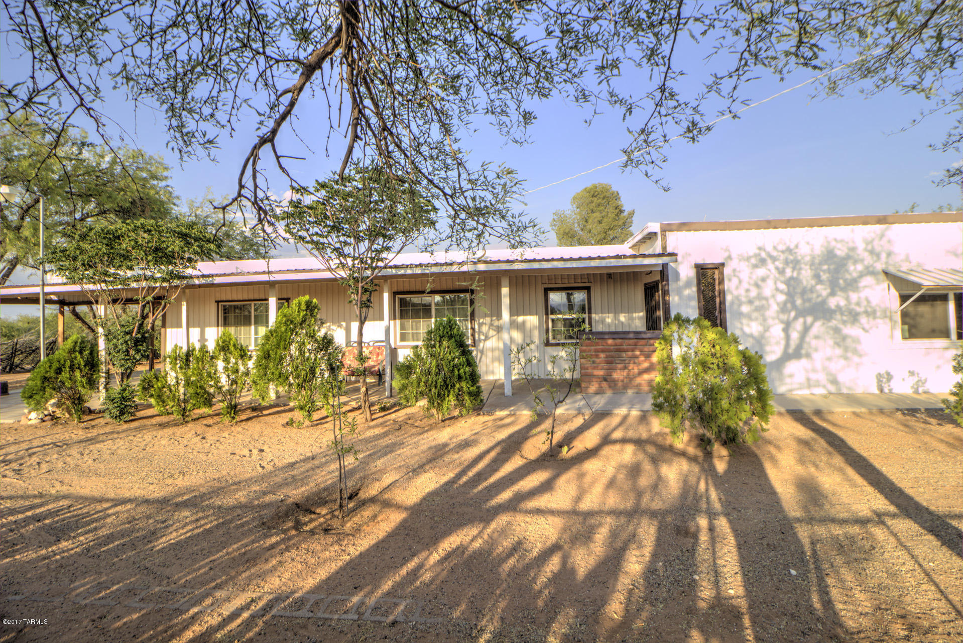 Do you like privacy, independence and self-sufficiency? This DIAMOND IN THE ROUGH may be just perfect place for you. It is 1.27 acre and on a paved road, has its own well, is totally fenced with 2 sections (one for your horse?) and has no HOA! Remodeling was already started on this rambling ranch with nearly 2400 square feet. It needs your finishing touches to make it shine. It features a heatilator fireplace, newer kitchen cabinets, HUGE master bedroom and master bath addition that could even be guest quarters. It's a unique opportunity for the right person who recognizes its possibilities. Seller will make no repairs to home.