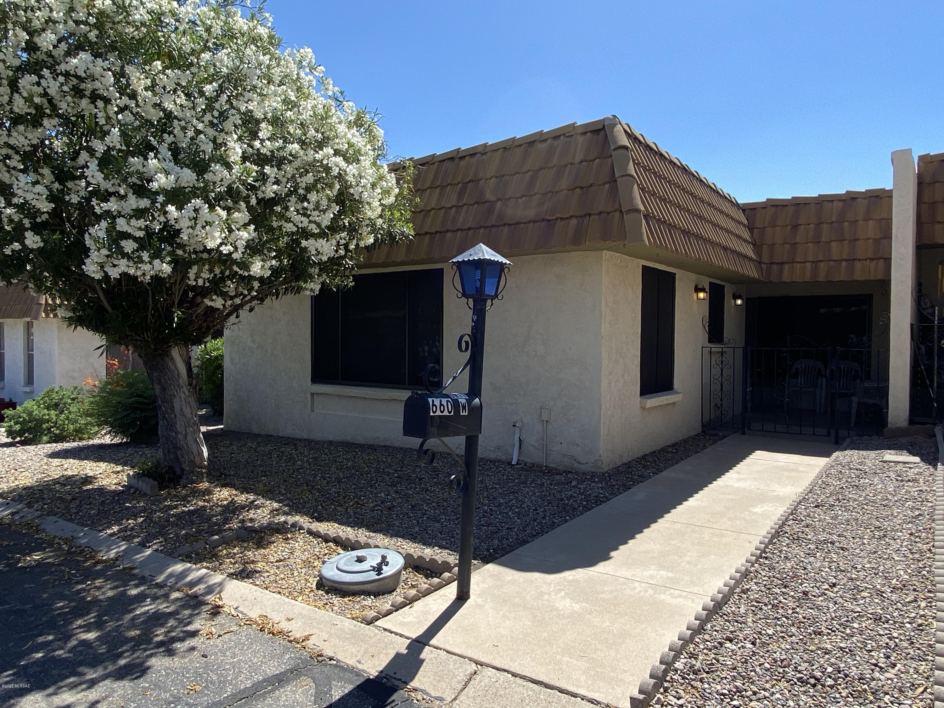 Beautiful 2 bed, 2 bathroom townhouse.  Very well maintained including a Brand New HVAC in 2020, newer water heater, security screens on all windows, updated bathrooms with granite vanity, shower tile, executive height sinks and light fixtures.  Furnishings negotiable.  Community pool, spa & BBQ.  HOA includes: Garbage collection, water, sewer, street maintenance.  Rentals and pets allowed.  Storage unit and 2 covered parking spots included.  Move in ready!  A must see!