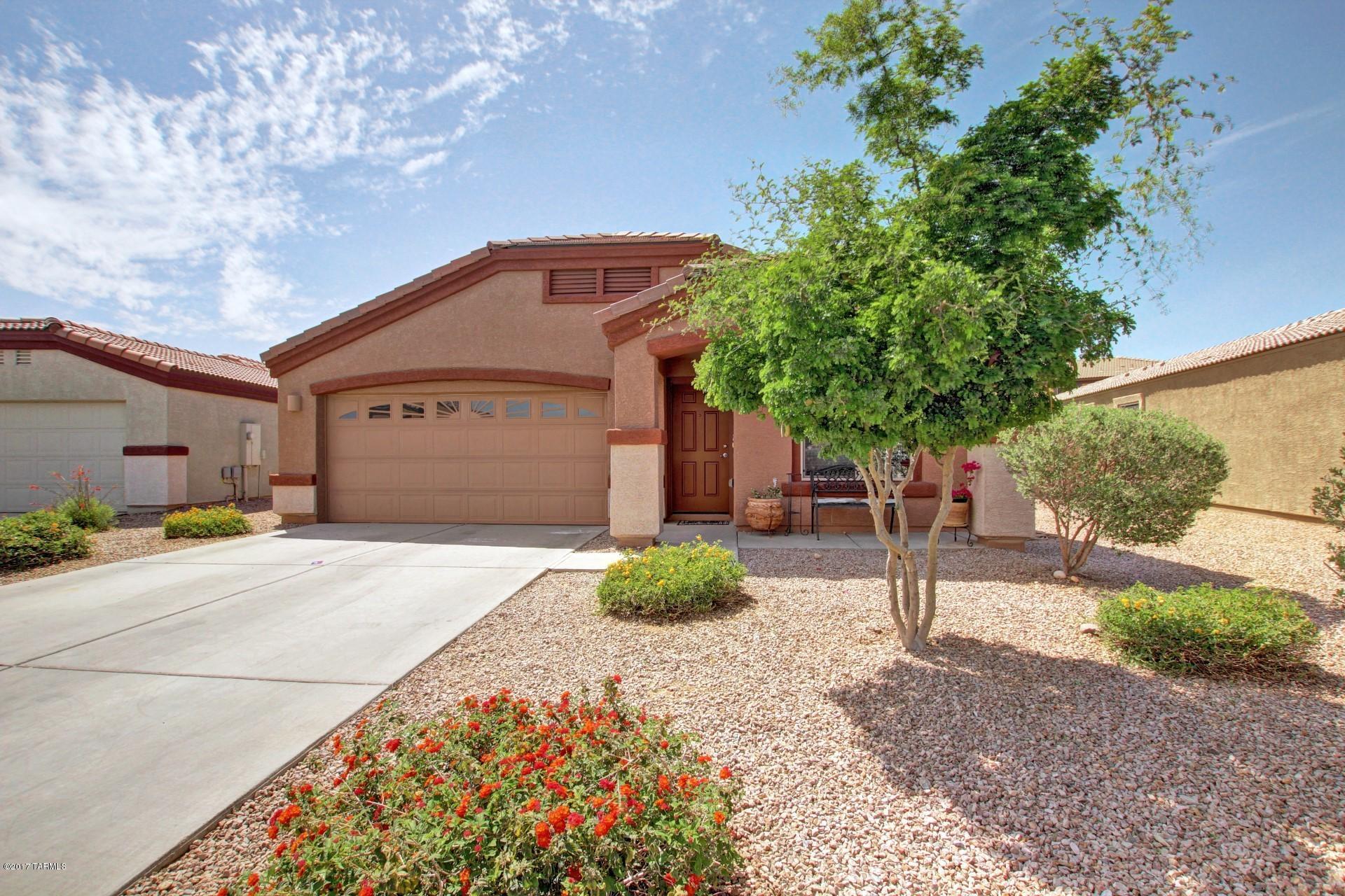 Amazing Mountain views!! This Beautiful home is situated in the wonderful gated community of The Pines. Built in 2013 and Resting on a huge lot that backs up to the Golf Course!! This home features 4 bedrooms (den converted) and 2 bathrooms. Open and bright floor plan. Tile flooring in all the right places and ceiling fans in every room.  Gorgeous kitchen with added cabinets and breakfast bar. Spacious master suite. Take advantage of all the community has to offer. Easy access to I-10. Come take a view!!