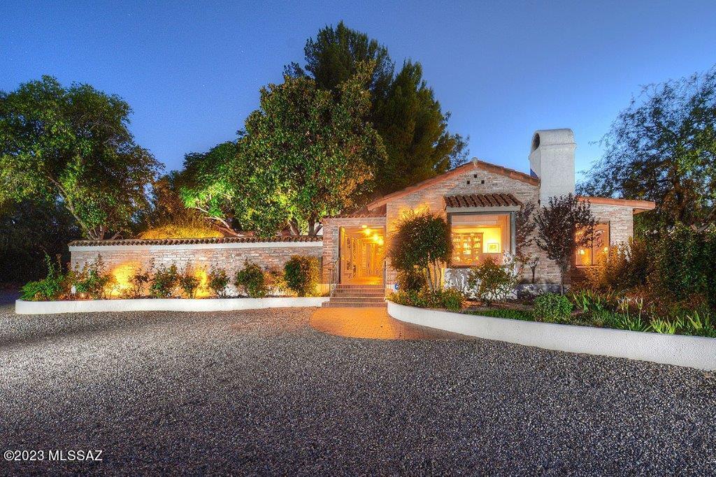 Enjoy this one of a kind Tubac Classic Home.  With over 3000 square feet of living space including 2 bedrooms and 2 baths PLUS an office and a library, this lovely property is as spacious as it is gracious! The homes layout makes it perfect to have a ''guest suite'' and/or ''caregivers quarters'' with a separate entrance yet connected to the main house.  Built of Burt Adobe Brick construction with a tile roof, two car garage, as well as a beautiful pool, and patio.  Also,  in addition to being connected to a private water company for domestic water use, this property has it's own WELL!!  With Old world charm and located on a quiet street, combined with lush vegetation and a private front courtyard. Just minutes to the Tubac this home has everything you need to enjoy the Tubac Lifestyle