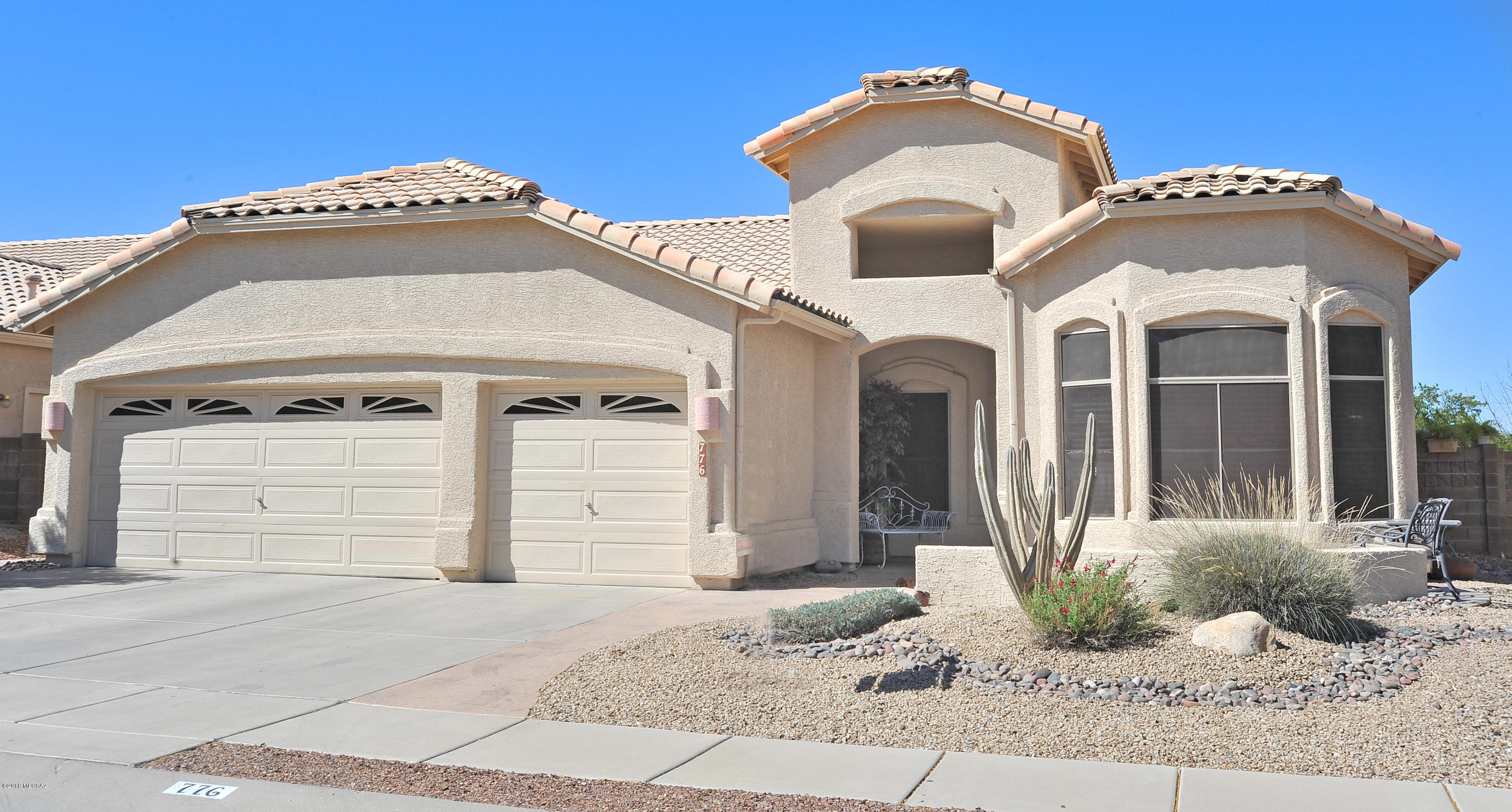 Sellers will accept or counter offers $280,000-$295,000! Show this pampered beauty to your most discriminating buyers! Extensive remodeling 2014-2017 to include quartz tops in island kitchen and both baths, new carpet, new AC & heat, interior & exterior re-painted, both baths updated etc.! Soaring ceilings, rounded corners, Hunter Douglas shades, solar screens and ceiling fans throughout! 3 car garage loaded with built-ins! Secluded backyard backs up to wash for total privacy & features extensive employment of masonry walkways, night lighting, lattice overhang, extra deep patio, lush grass on timed irrigation and hot tub!