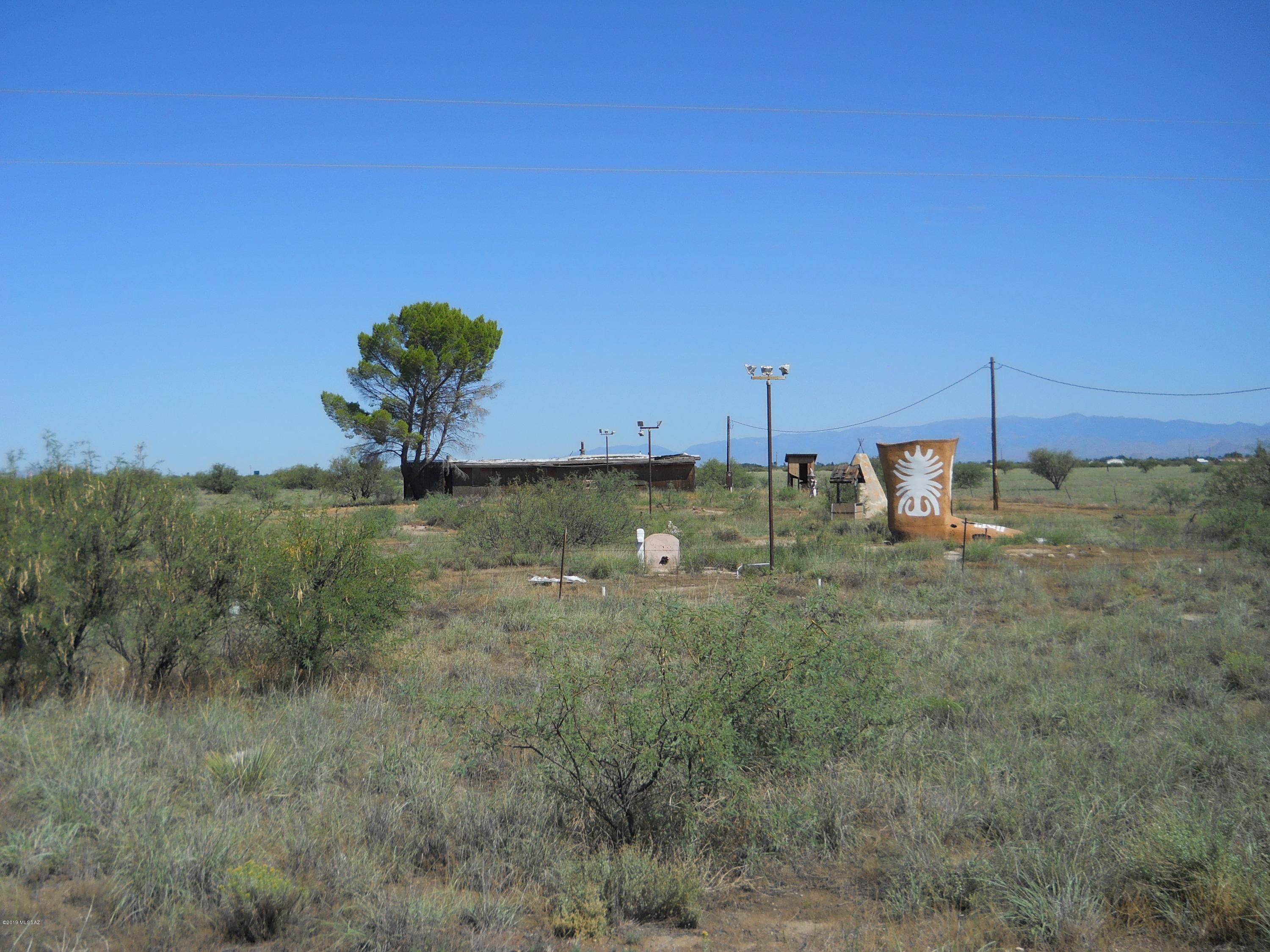 10.81 acres on south Haskell Ave (business I-10). Was used as a miniature golf coure. Property has a well  and septic system, an old mobile home that was the business office (has no value), and is fenced. it has 201, of frontage on Haskell Ave (Business I-10).