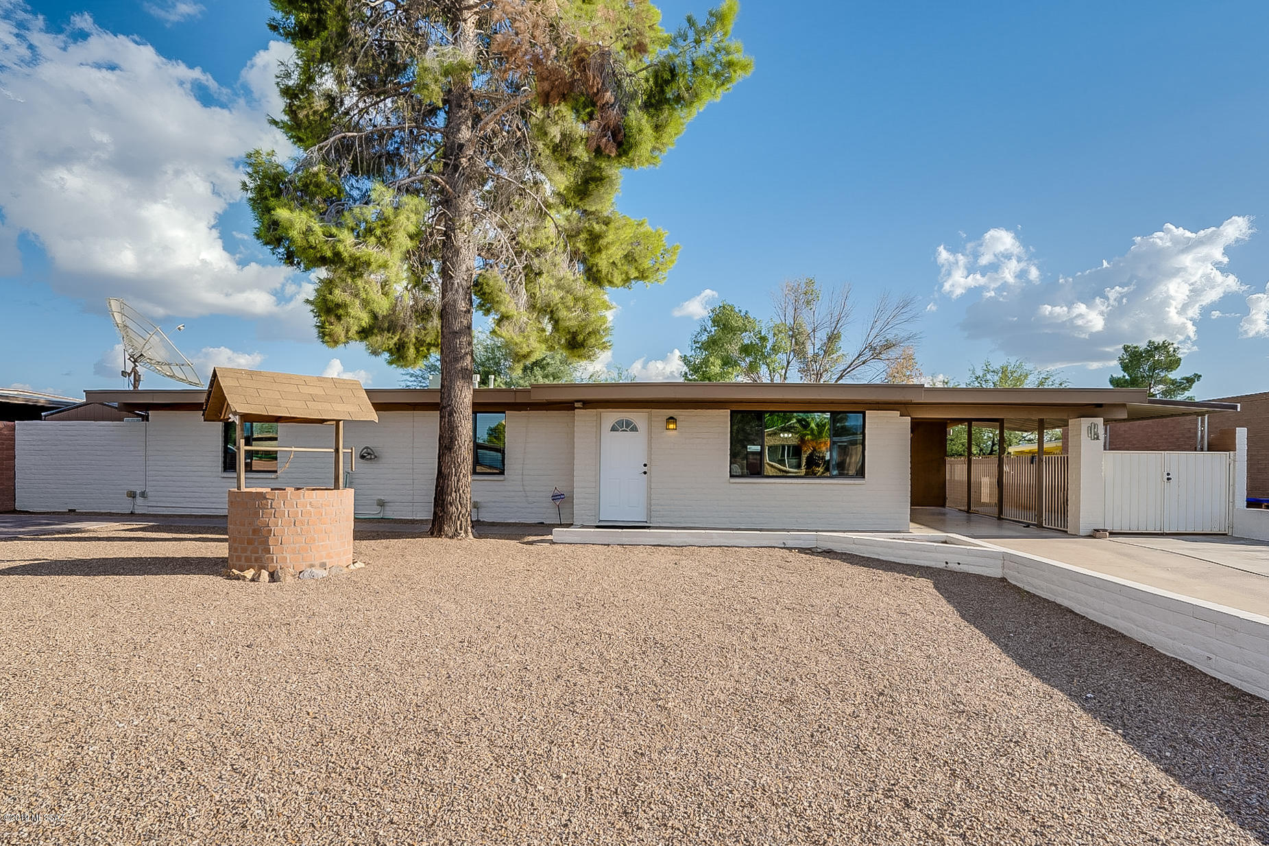 Beautiful Heritage Hills Home located in Desirable NW neighborhood.  Open and bright floor plan including 3 bedrooms 2 bath, bonus craft/hobby room.  Upgraded laminate and tile throughout all living spaces.  Large kitchen with stainless steel appliances.  Carpet installed 2019, freshly painted interior.  Backyard perfect for entertaining, featuring large play pool, extended paver patios, outdoor beehive fireplace, large grassy area, 2 storage buildings. extended parking areas with 2 car carport, additional extended pavered driveway.  
Listing agent related to sellers